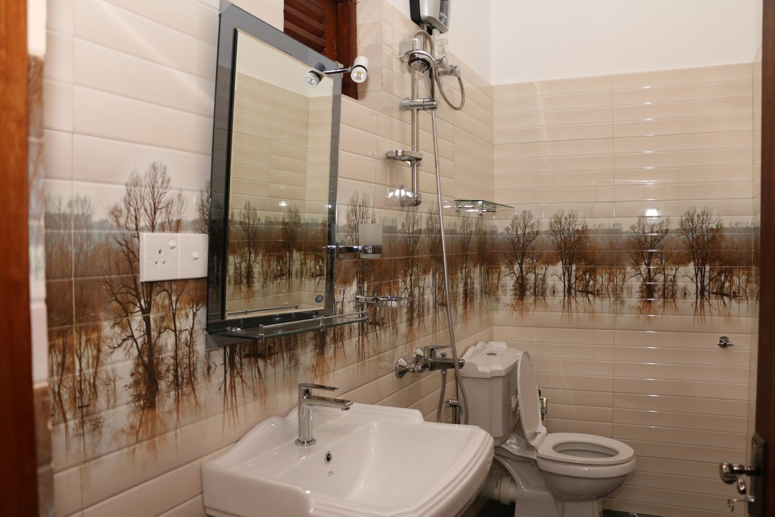 Deluxe Single Room with Fan photo 2