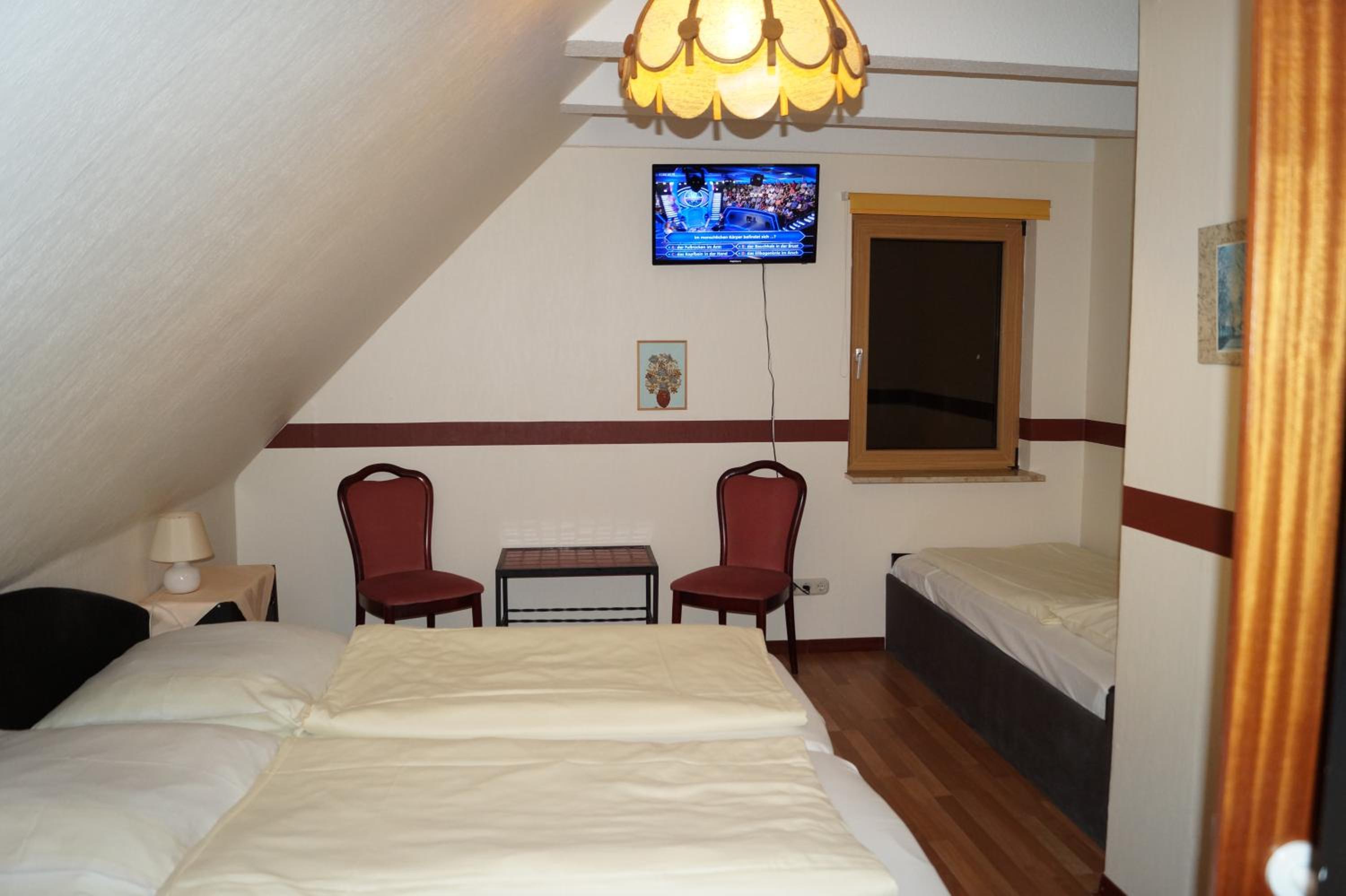 Economy Triple Room - Photo 1