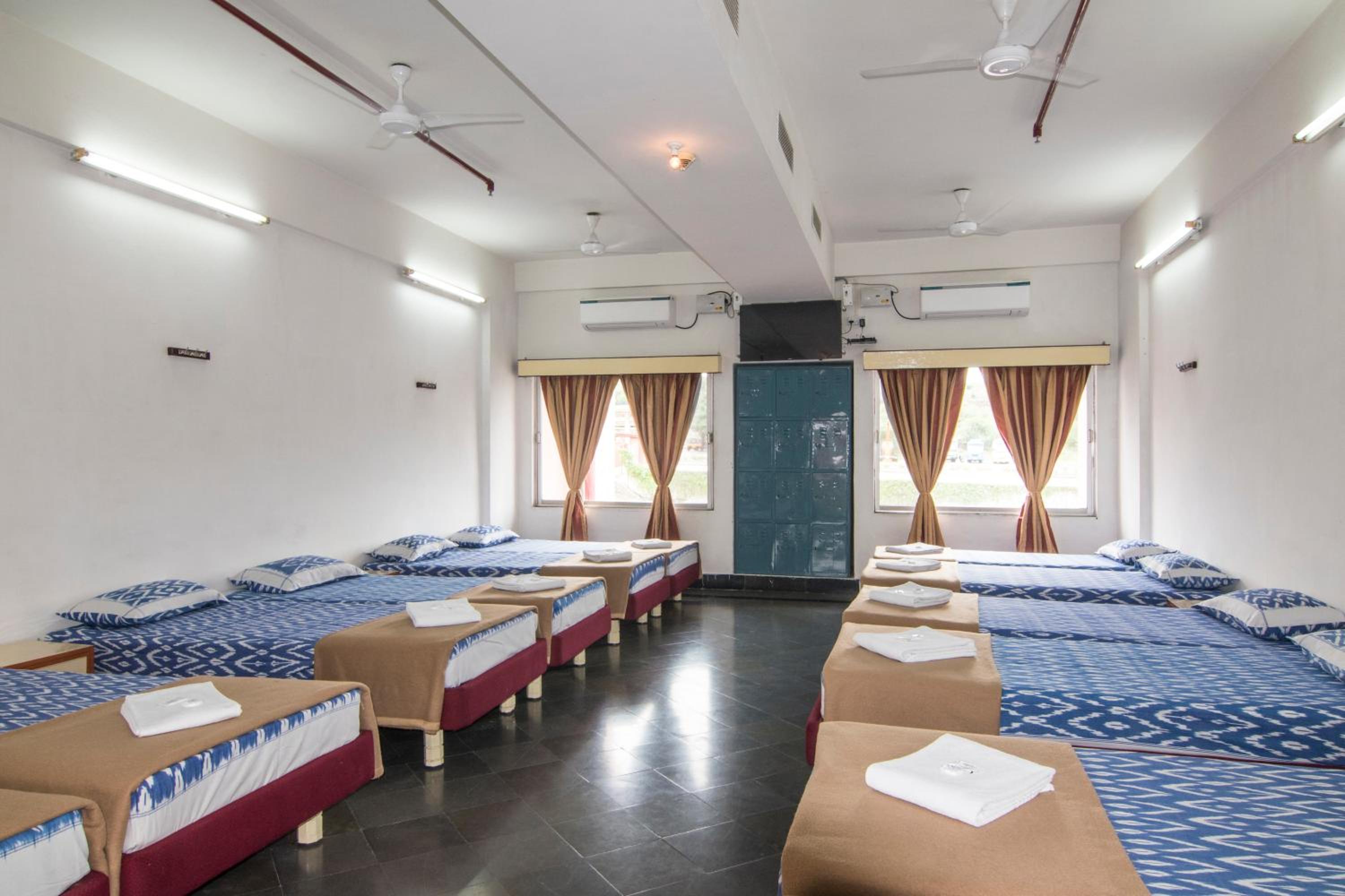 Single Bed in Male Dormitory Room with Shared Bathroom photo 1