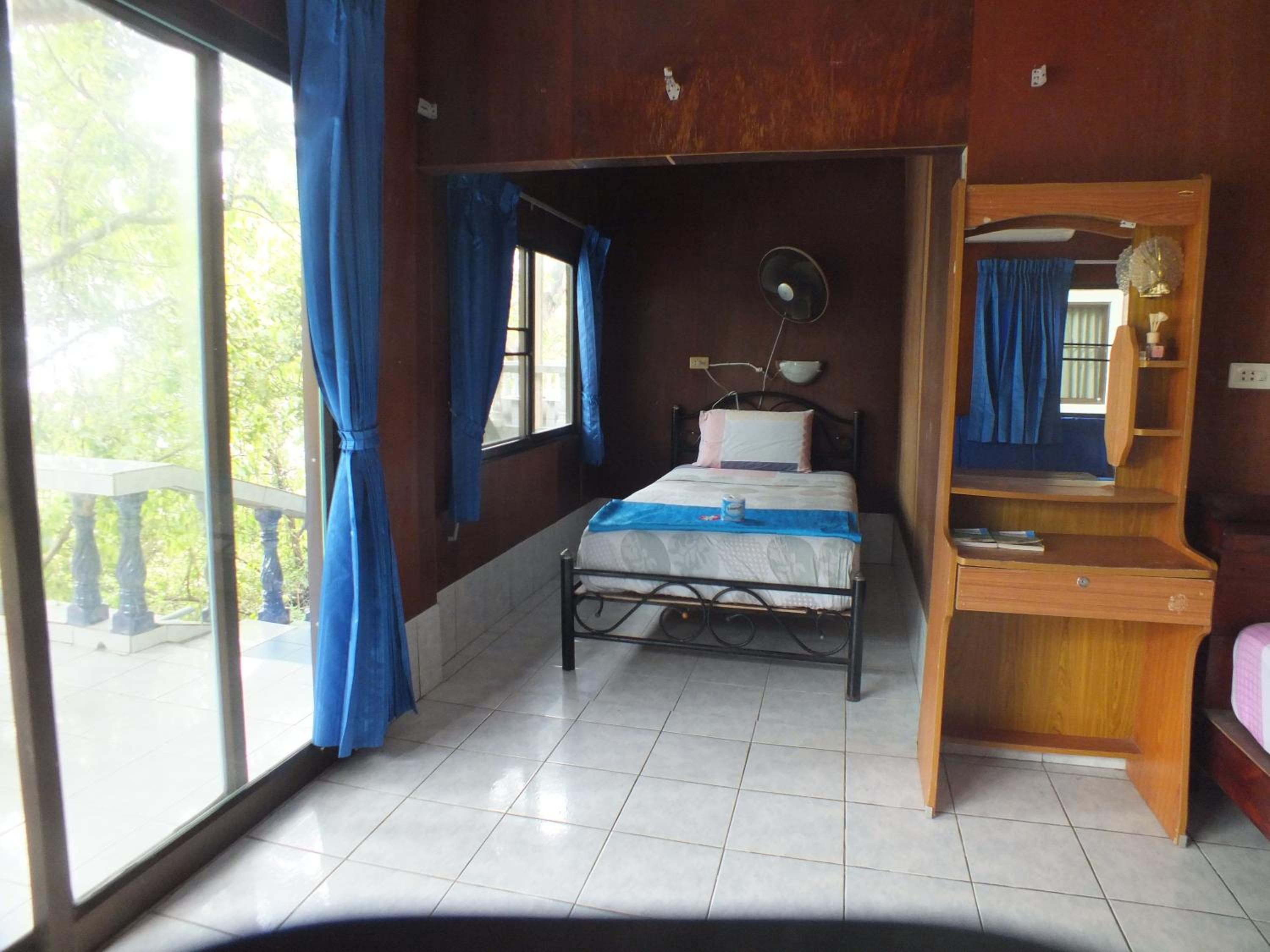 Family Room with Fan and Balcony