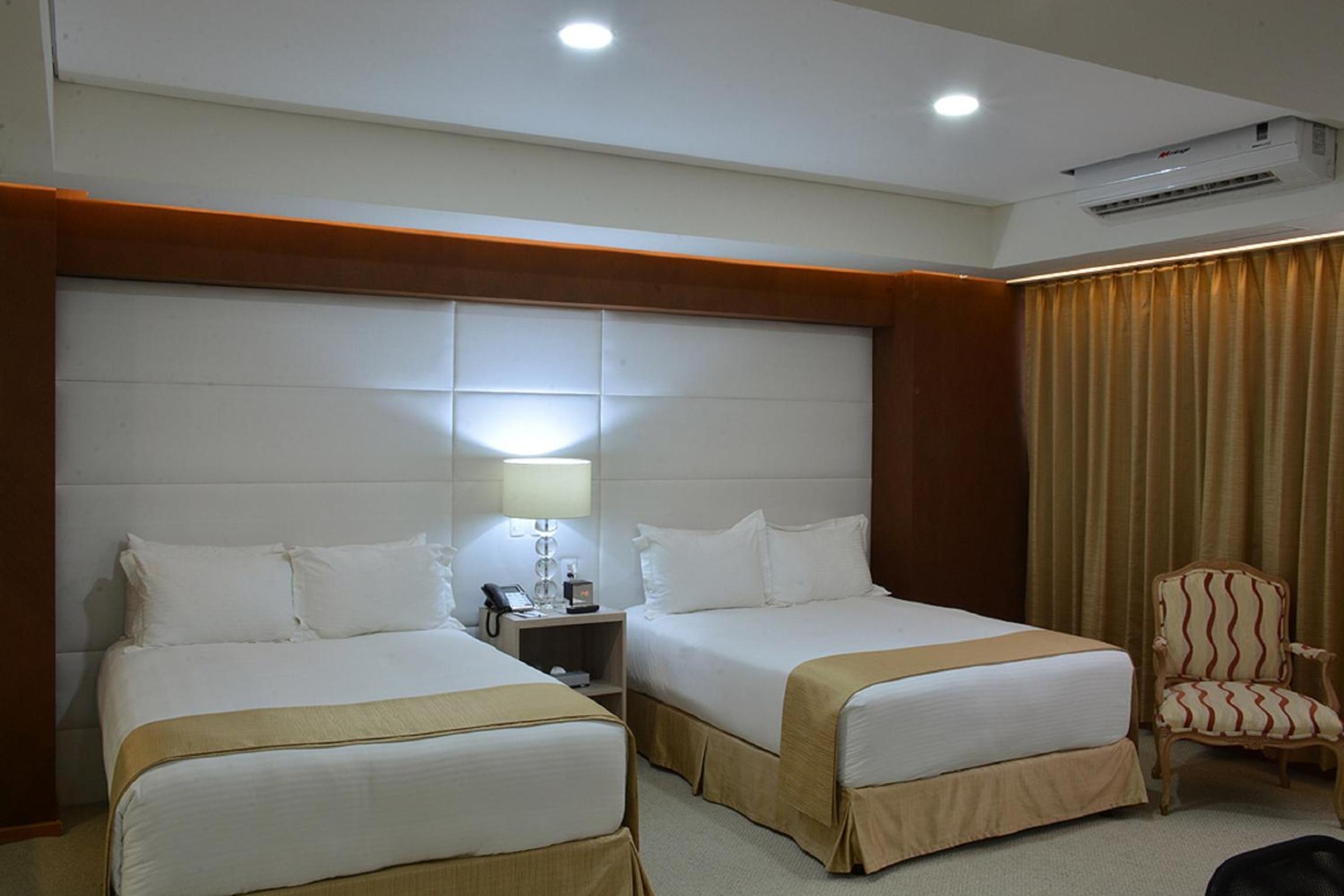 Deluxe Queen Room with Two Queen Beds - Photo 12