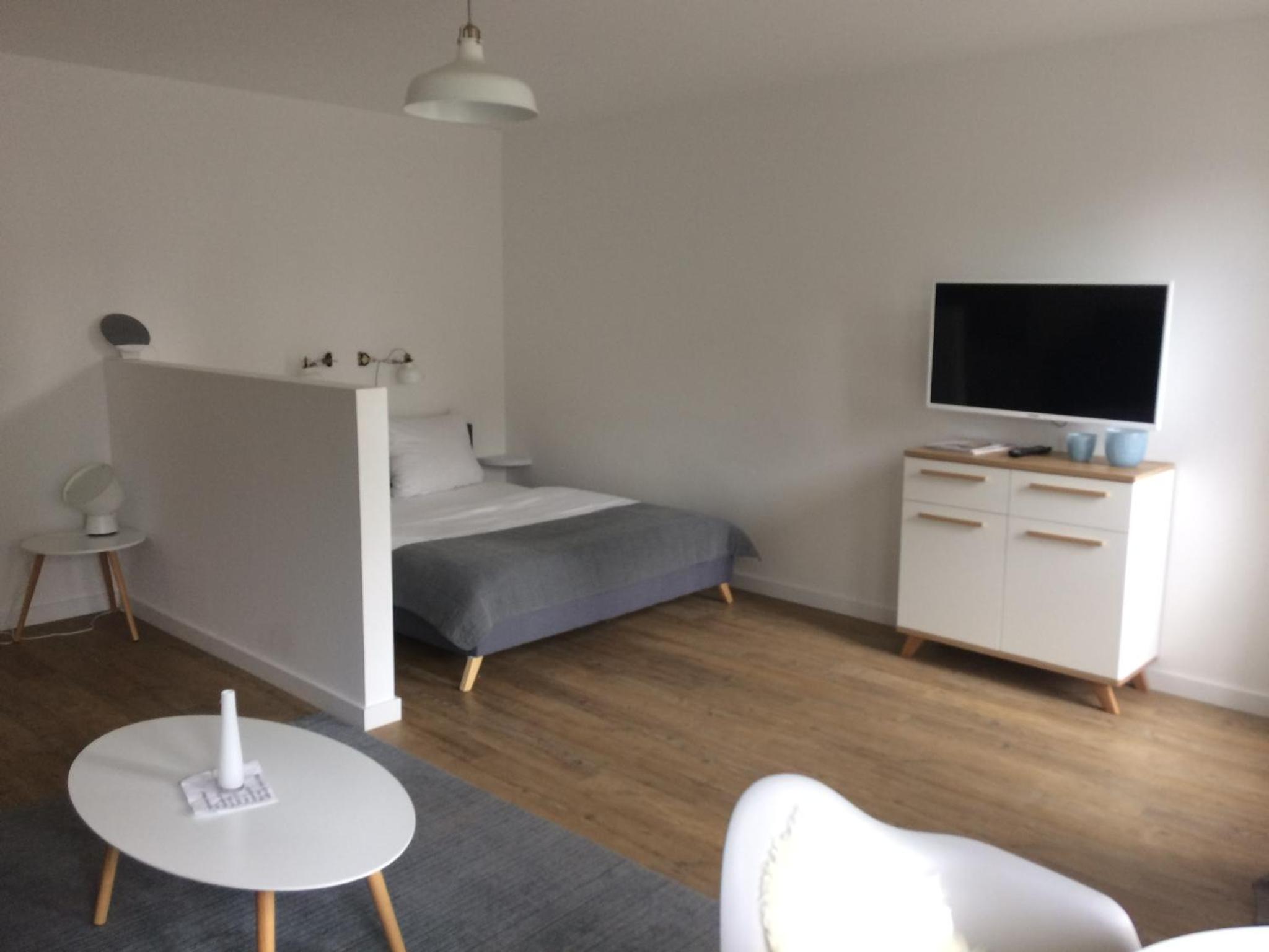 Apartment with Balcony - Photo 13