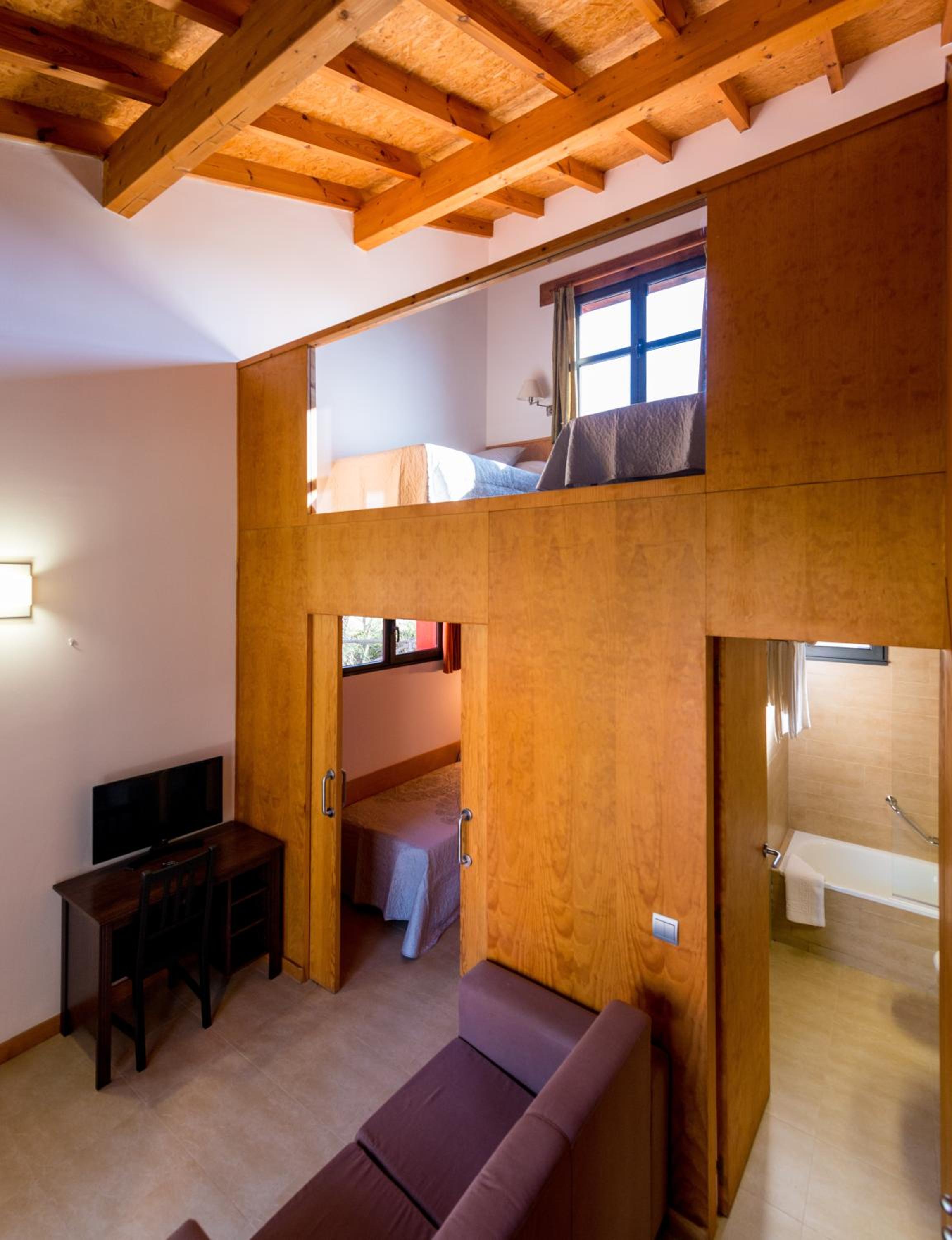 Habitación Cuádruple con Vista al Jardín