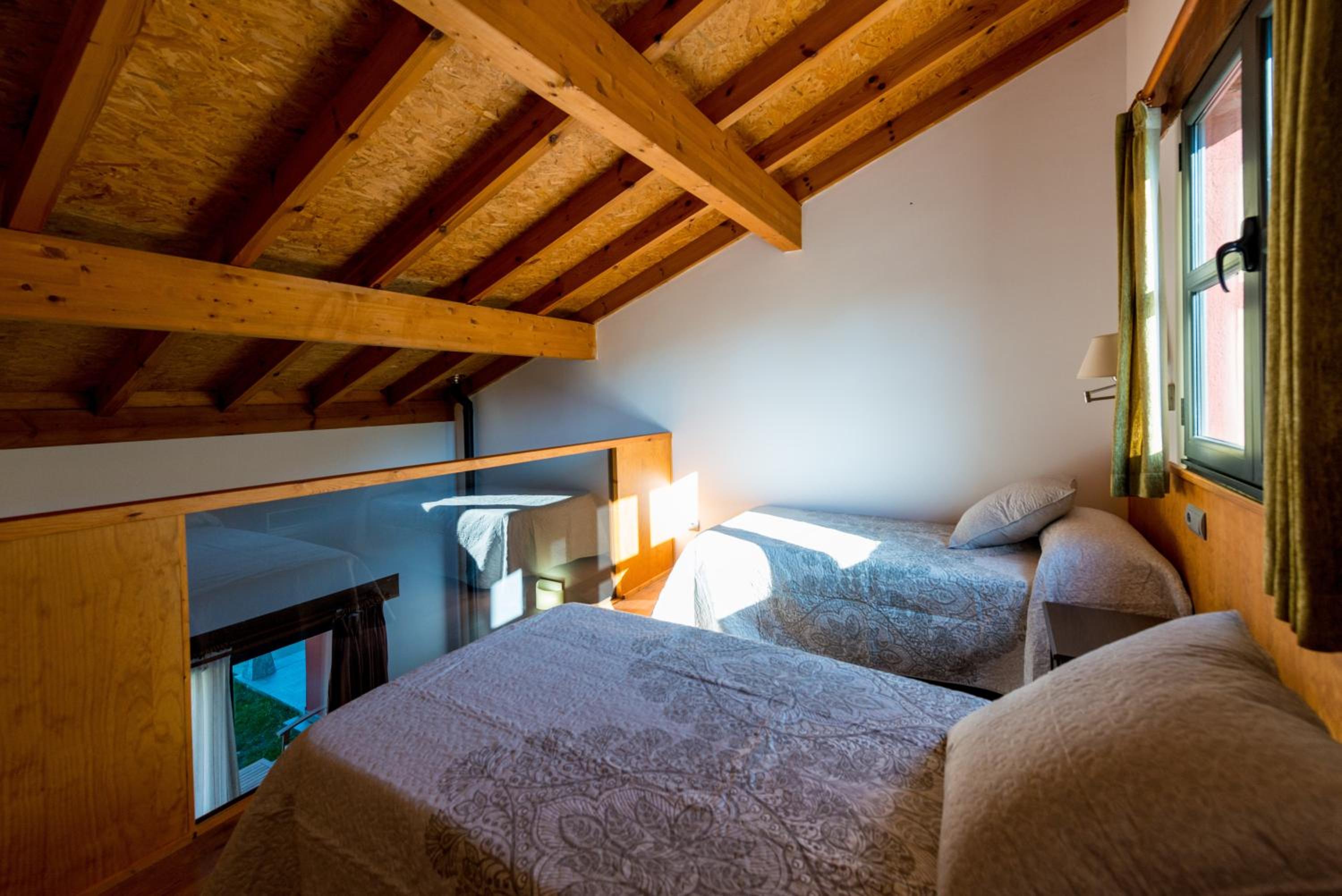 Habitación Cuádruple con Vista al Jardín