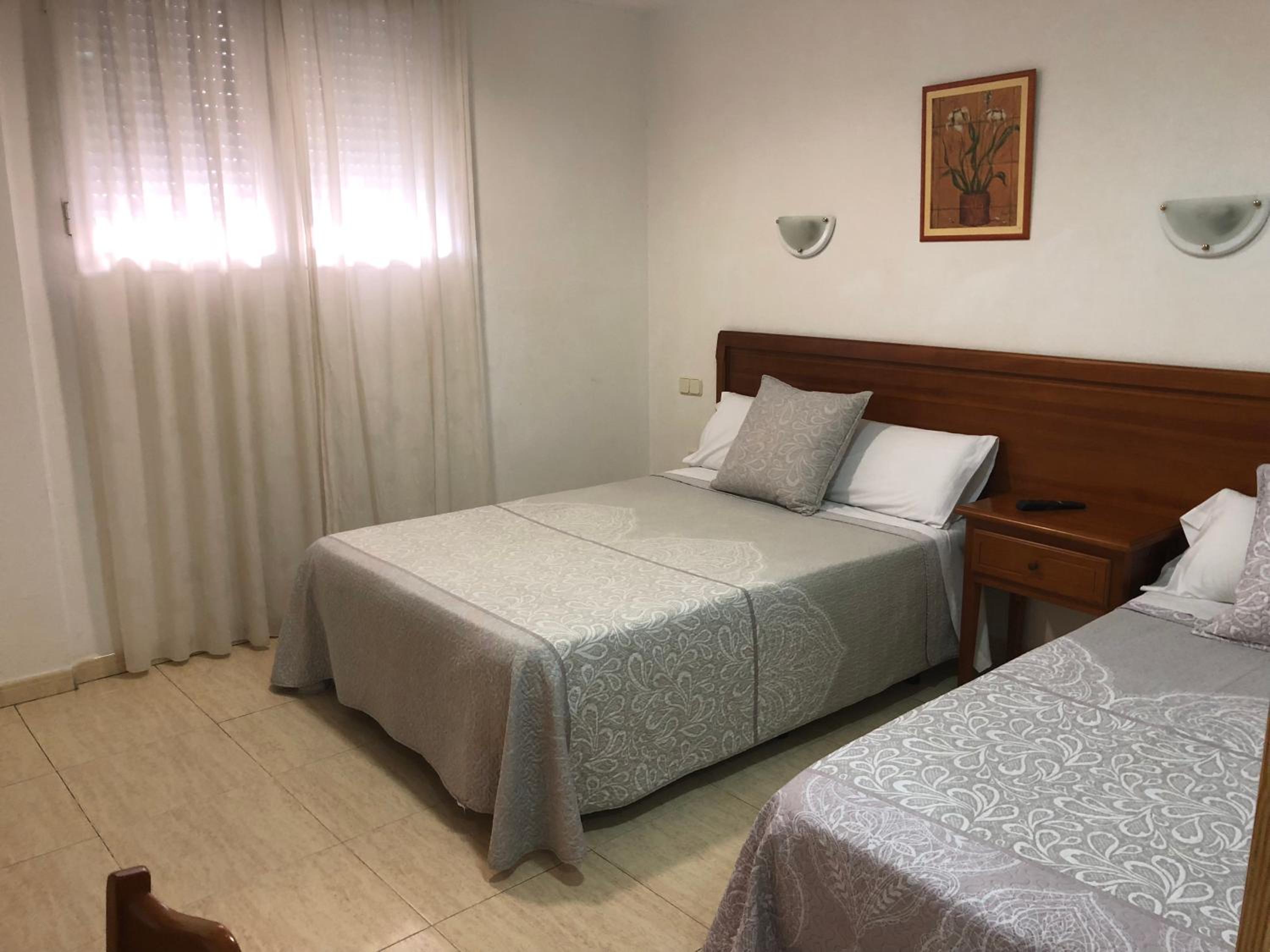 Habitación triple con ducha