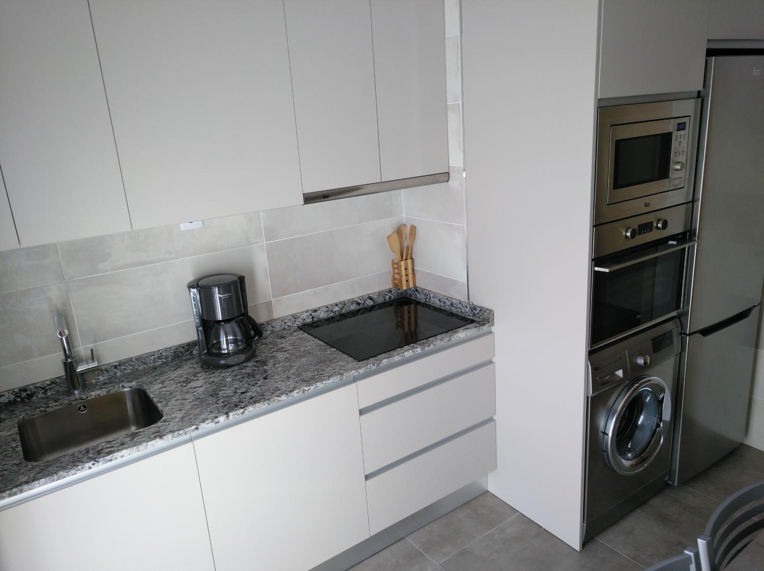 Three-Bedroom Apartment - Photo 61
