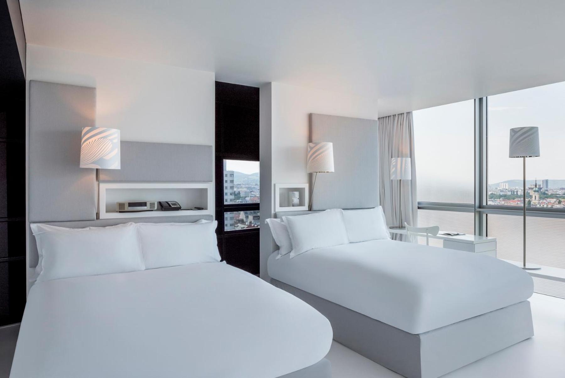Corner Queen Room with Two Queen Beds and Ferris Wheel View - Photo 1