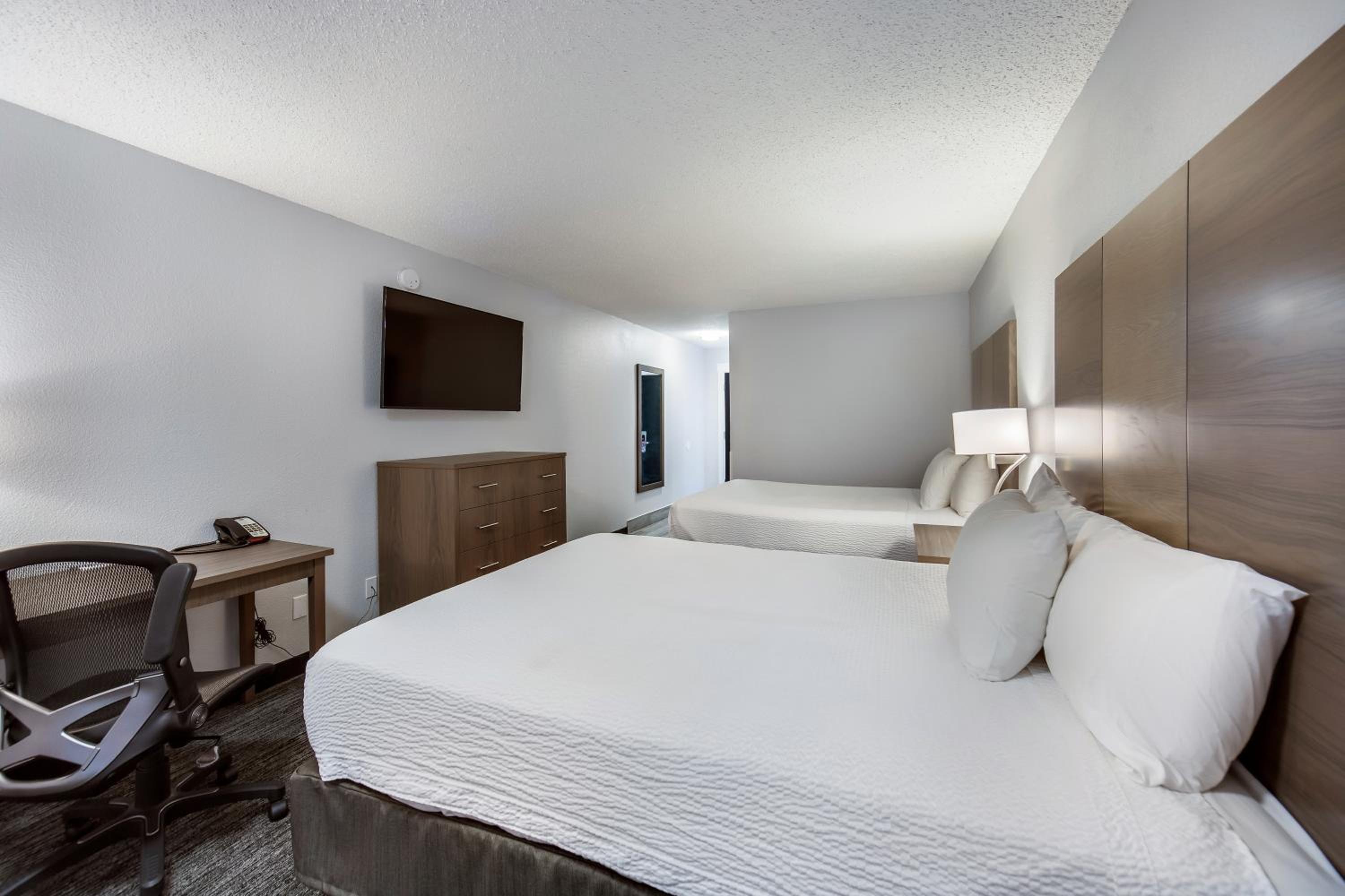 Queen Room with Two Queen Beds - Photo 1