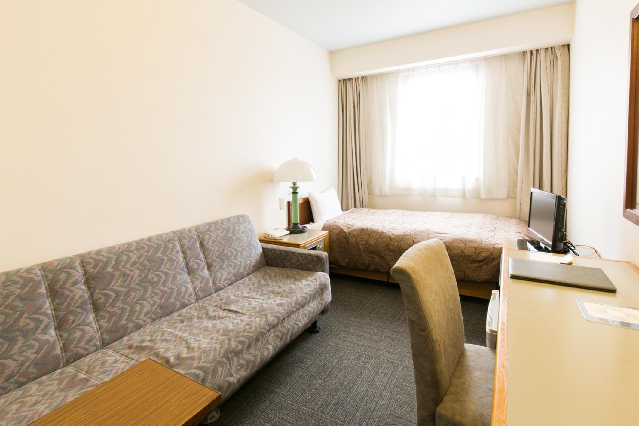 Single Room with Sofa - Smoking
