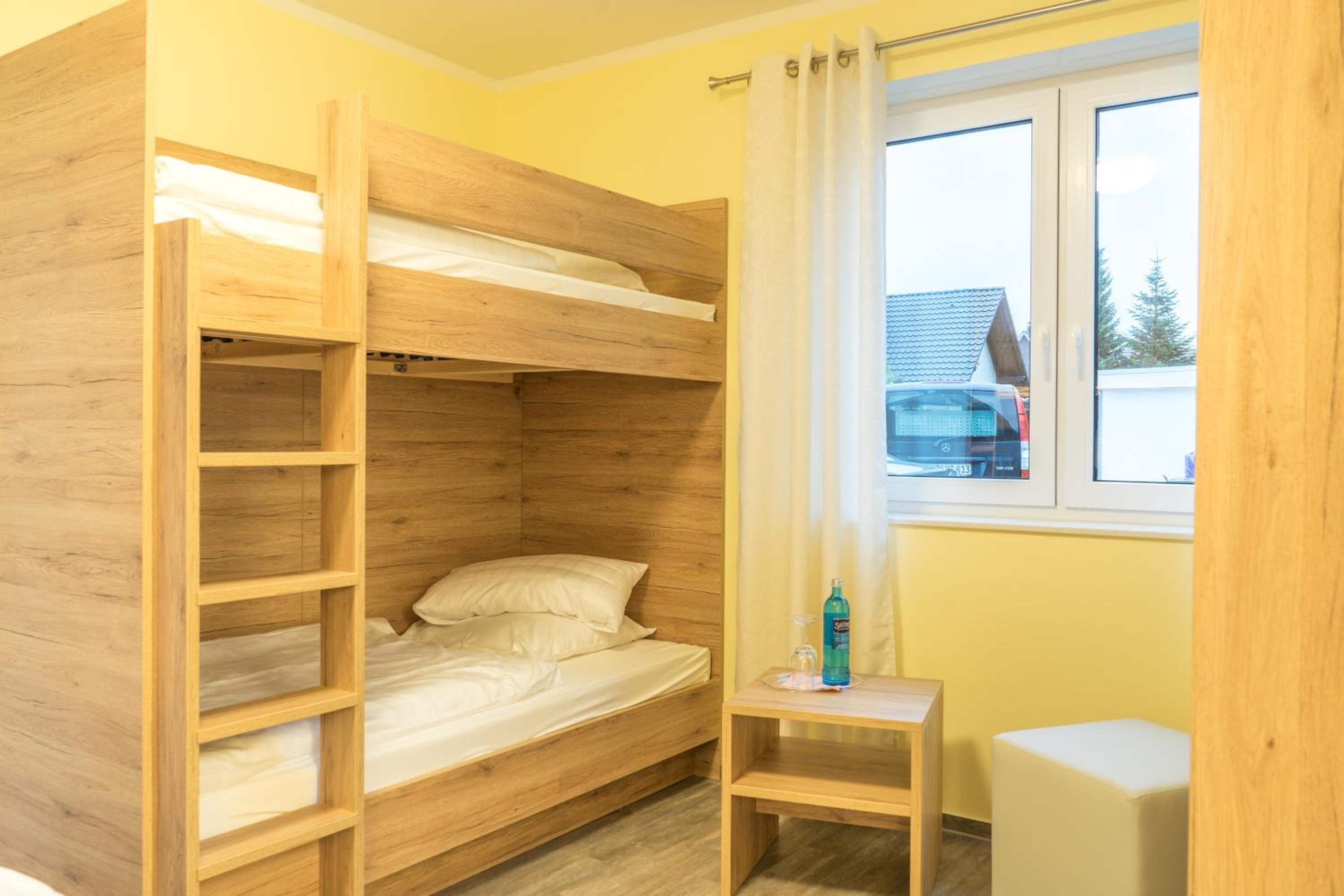 Deluxe Family Suite - Photo 2