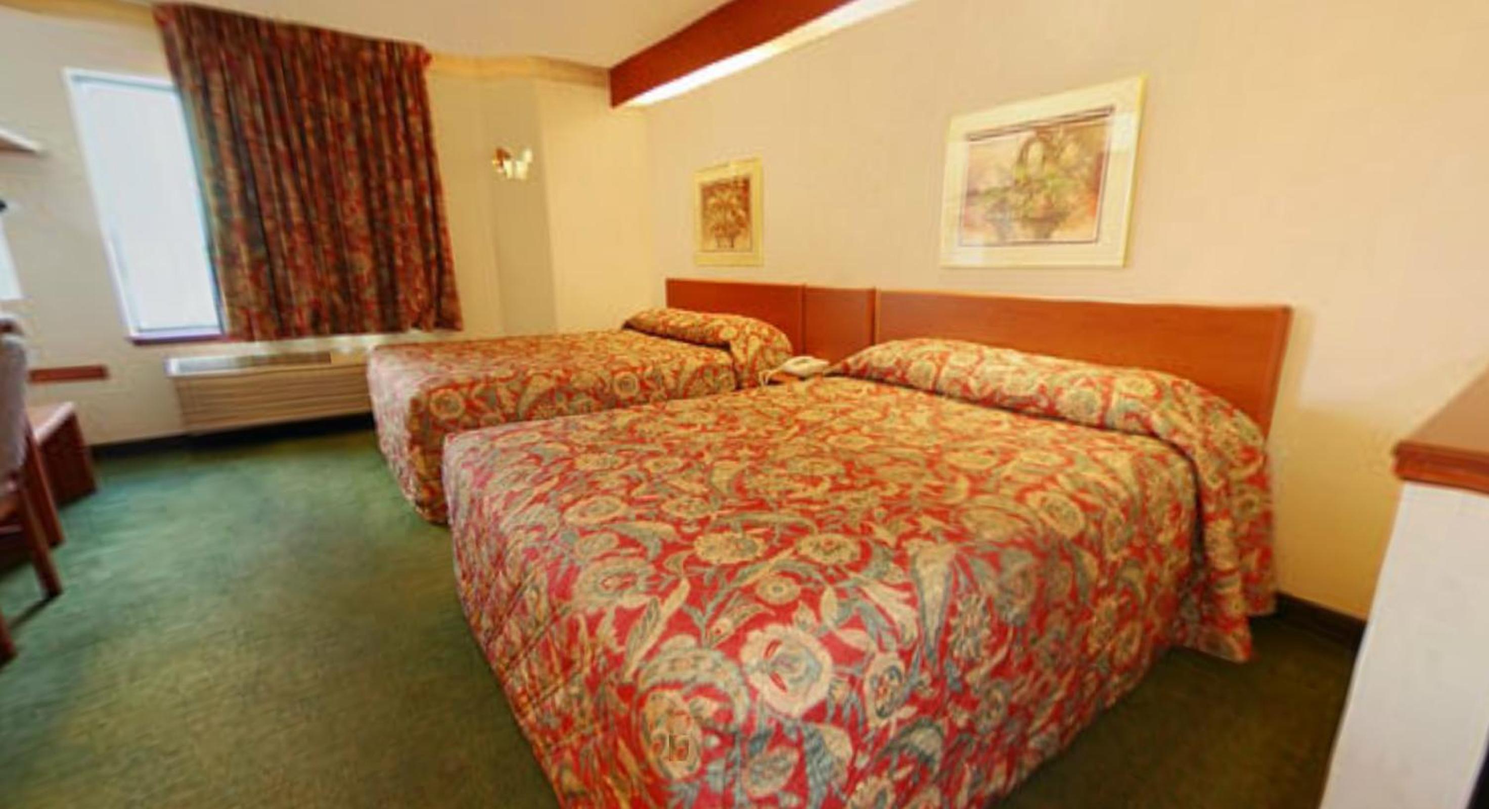 Queen Room with Two Queen Beds - Photo 1