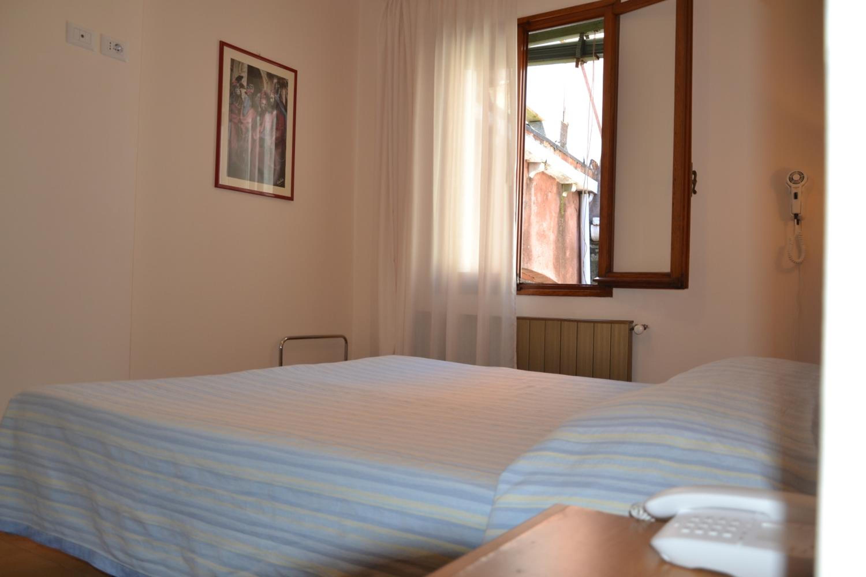 Small Double Room with Private External Bathroom photo 1