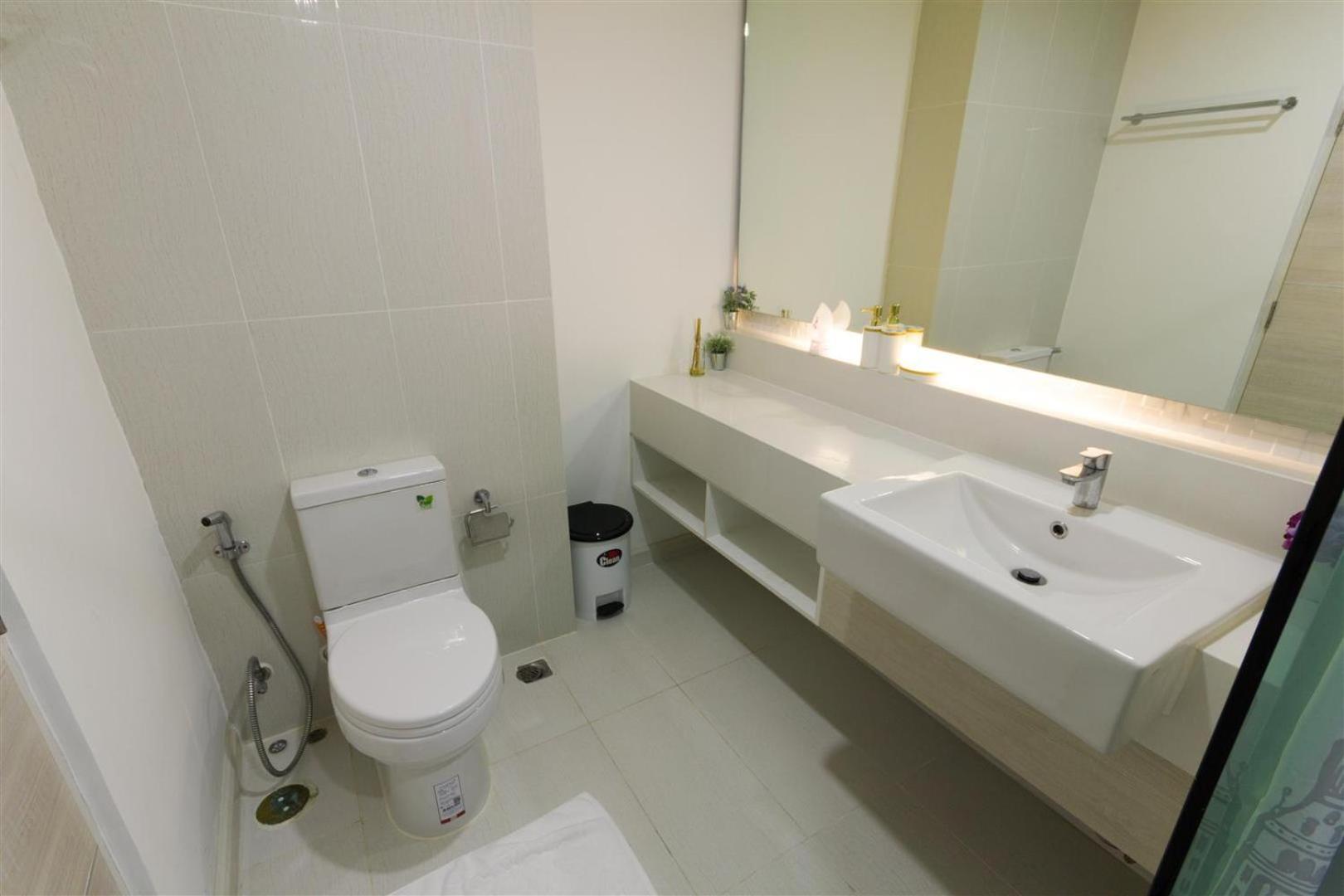 Two-Bedroom Apartment - Photo 16