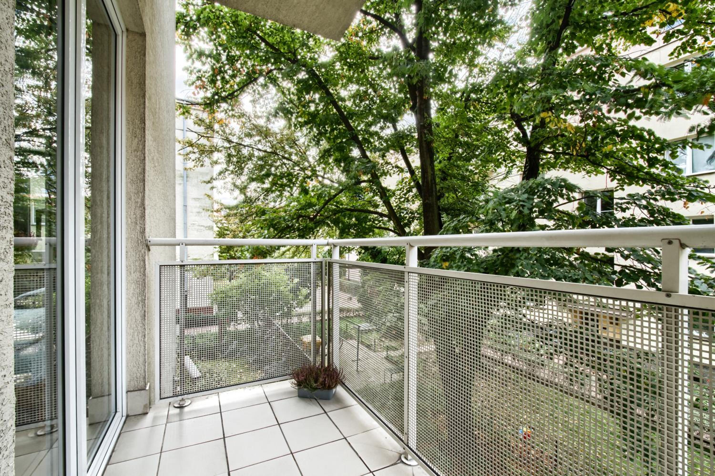 Three-Bedroom Apartment - Photo 36