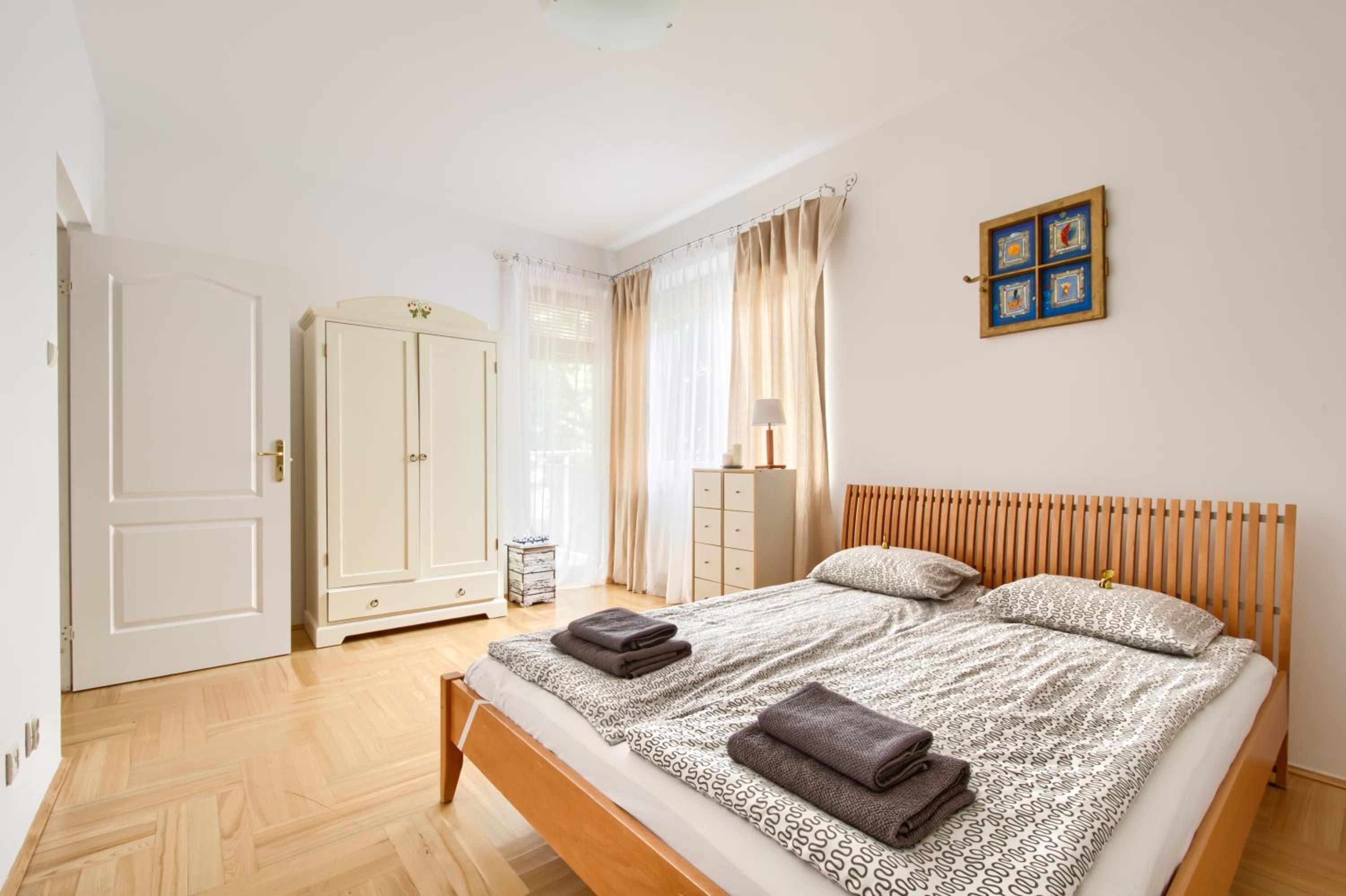 Three-Bedroom Apartment - Photo 40