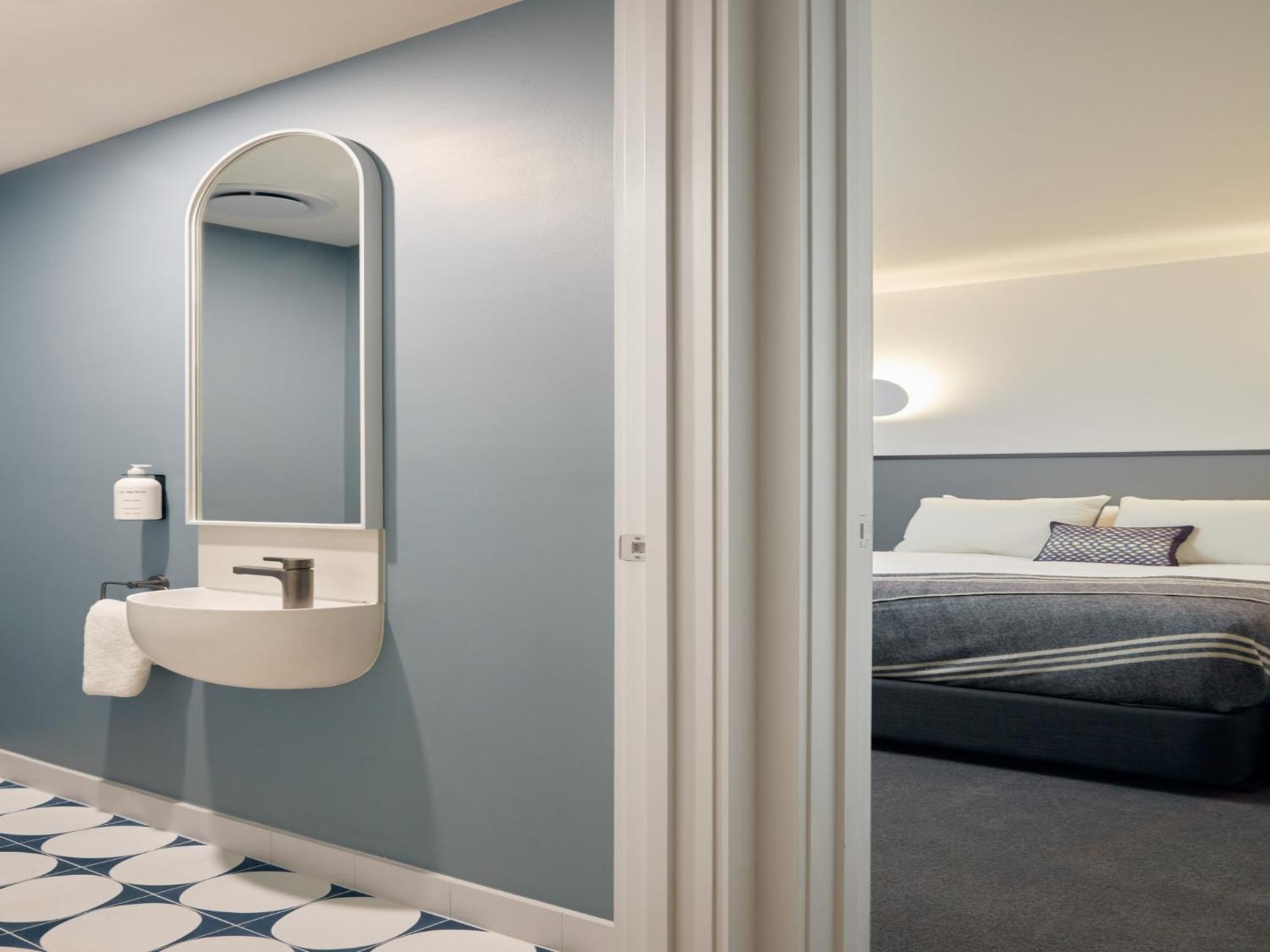 Three-Bedroom Apartment - Photo 18