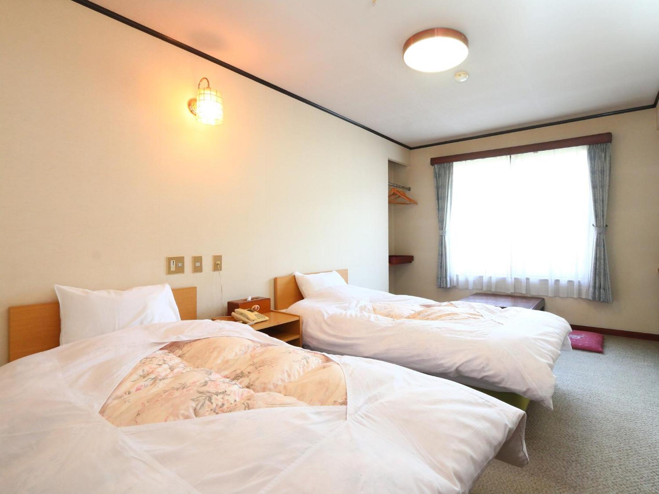 Twin Room - Non-Smoking - Photo 6