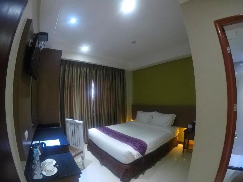 Deluxe Room - Photo 1