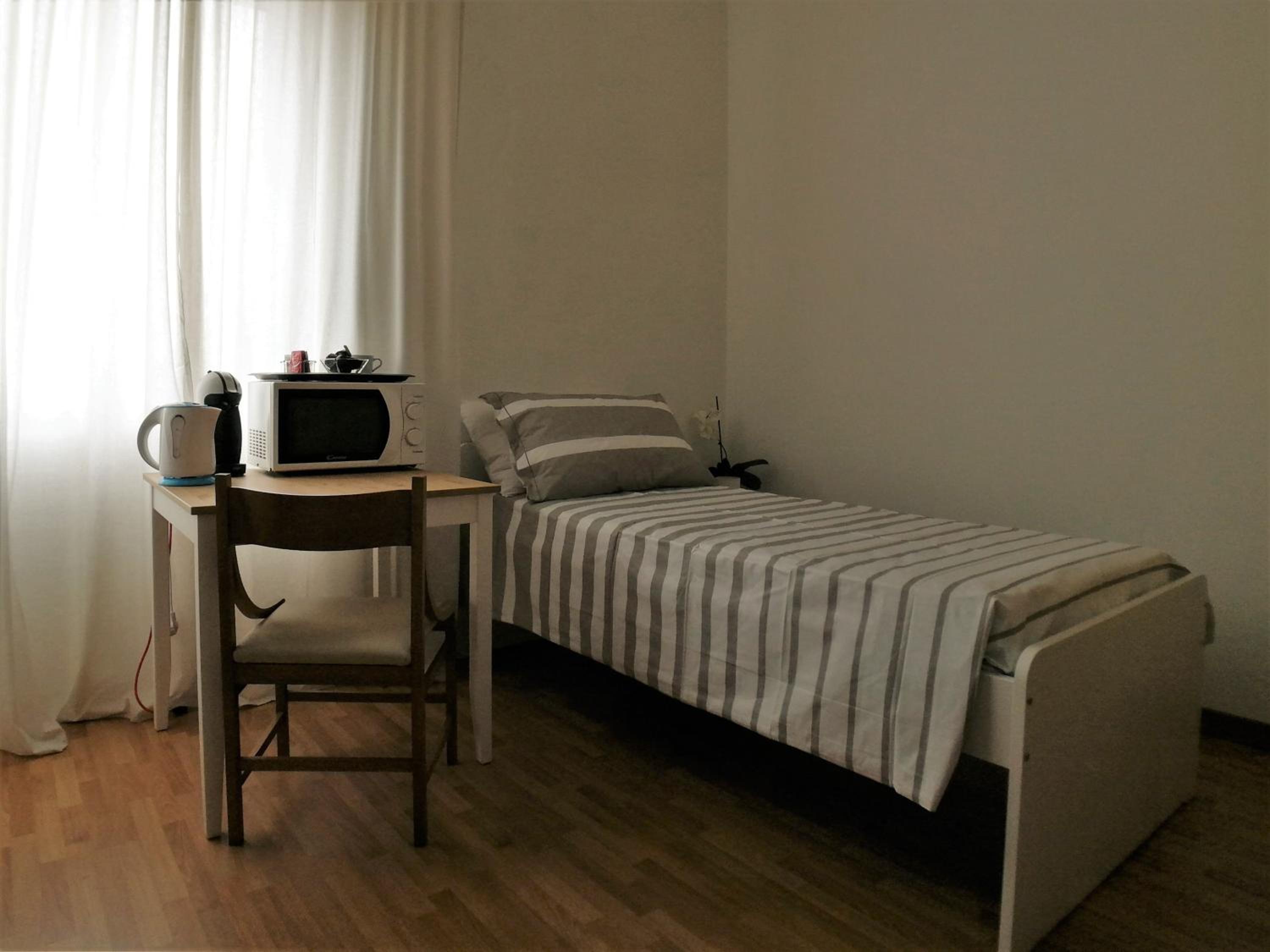 Single Room with Private Bathroom photo 1