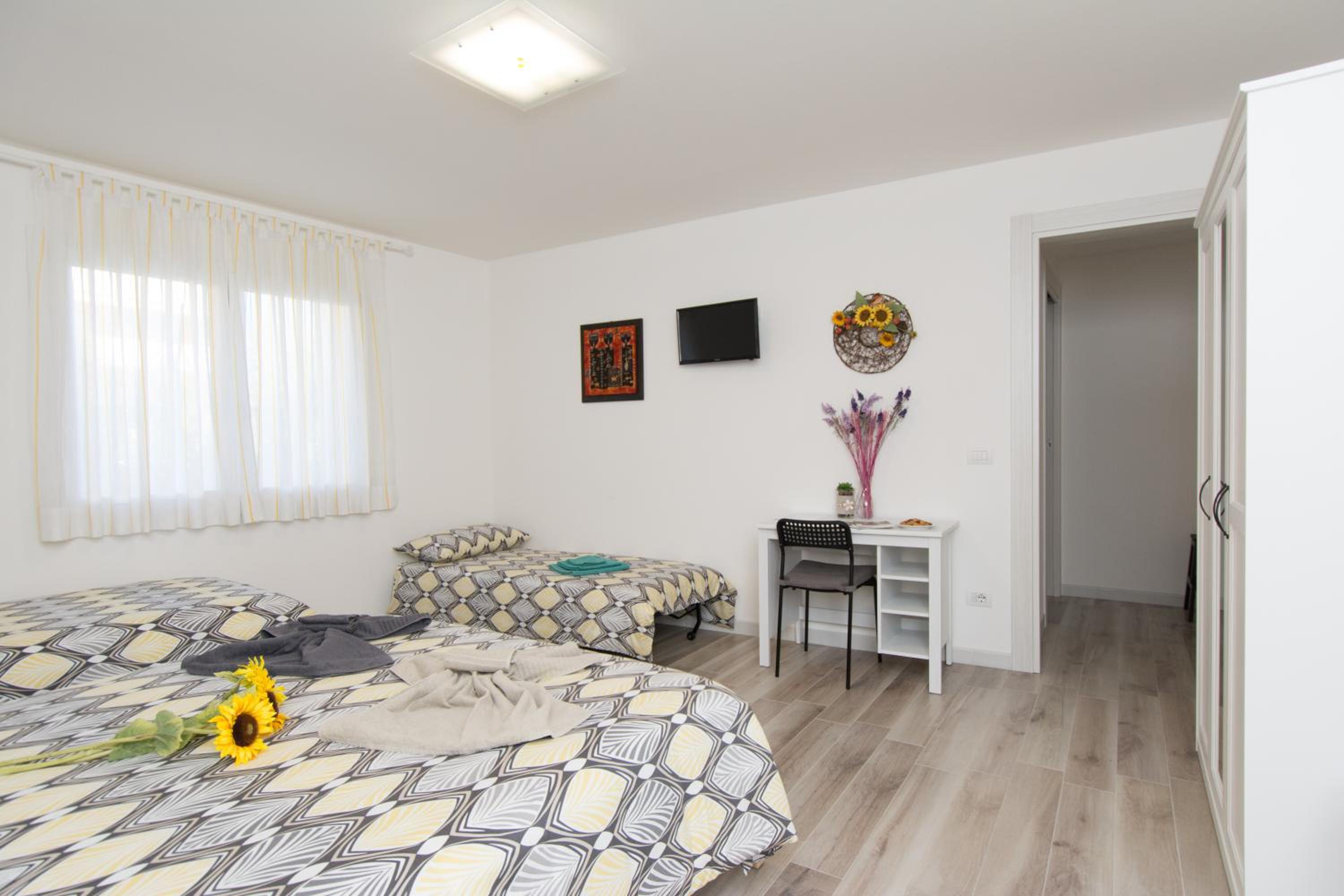 Quadruple Room with Private Bathroom photo 1