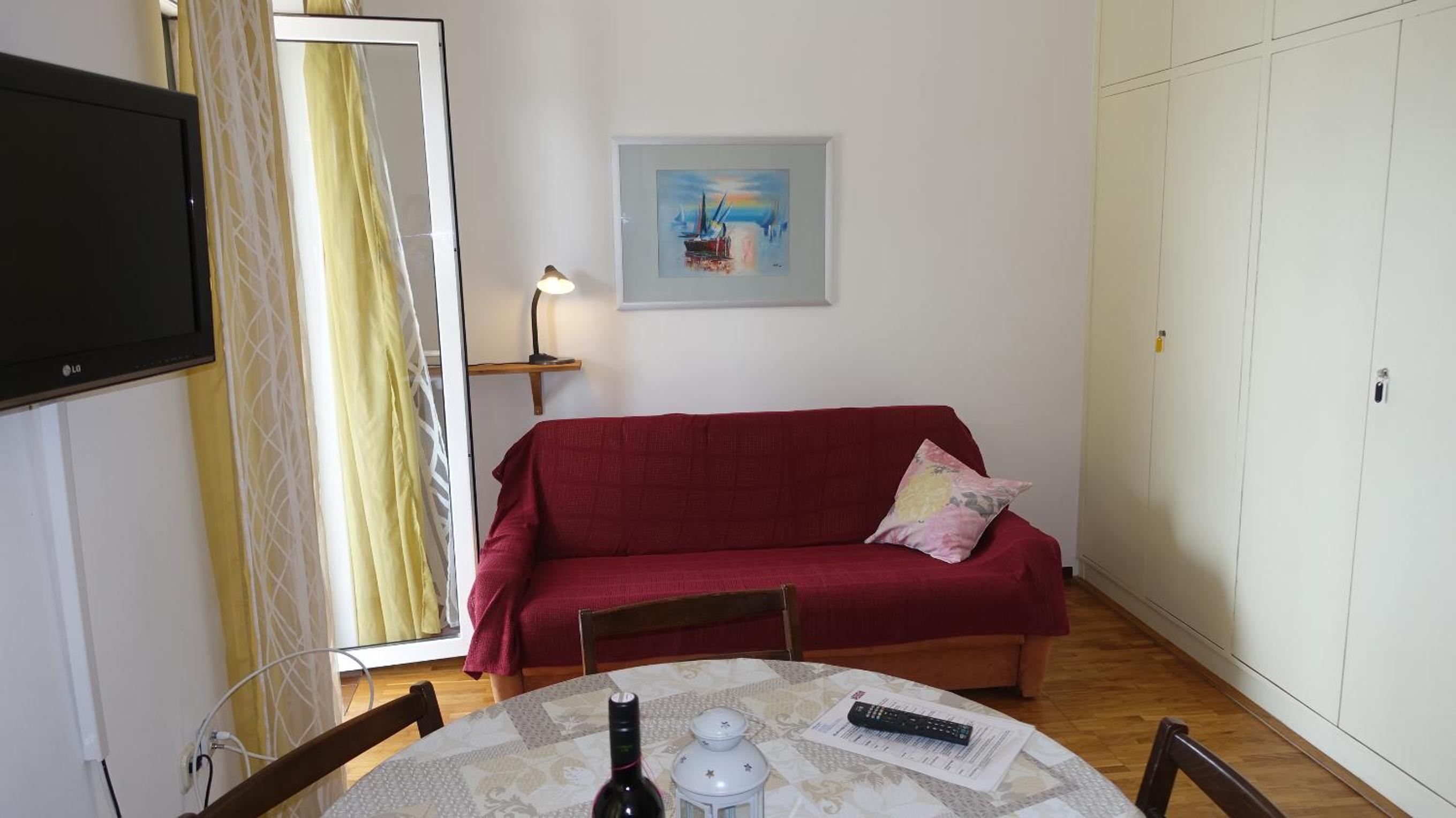One-Bedroom Apartment with Balcony and Sea View