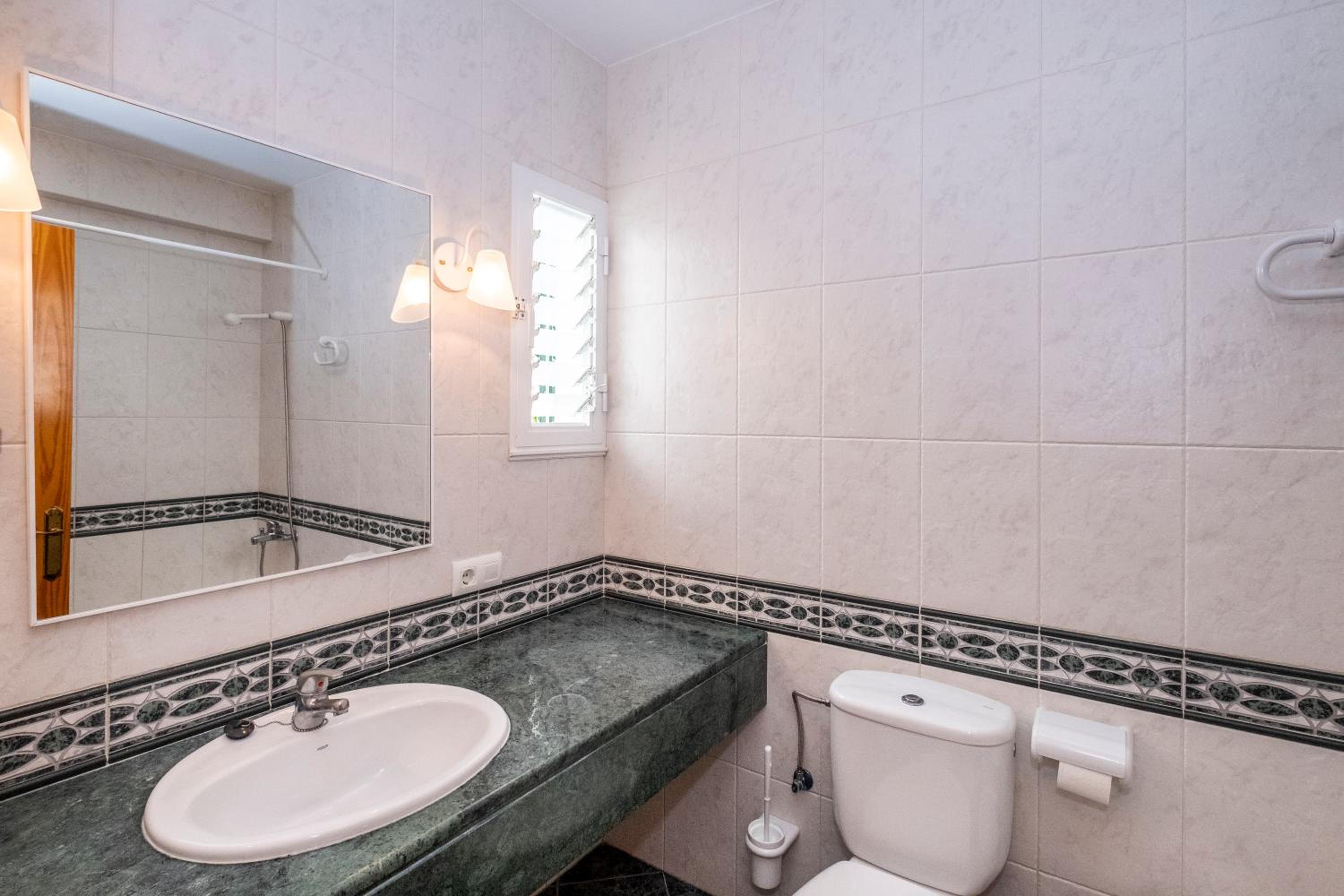 Three-Bedroom House photo 2