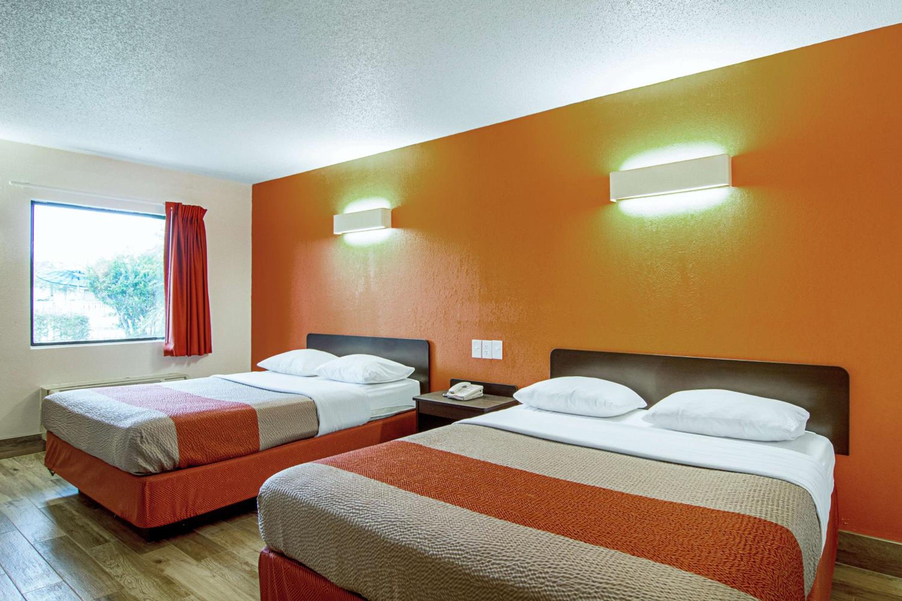 Queen Room with Two Queen Beds - Smoking - Photo 1
