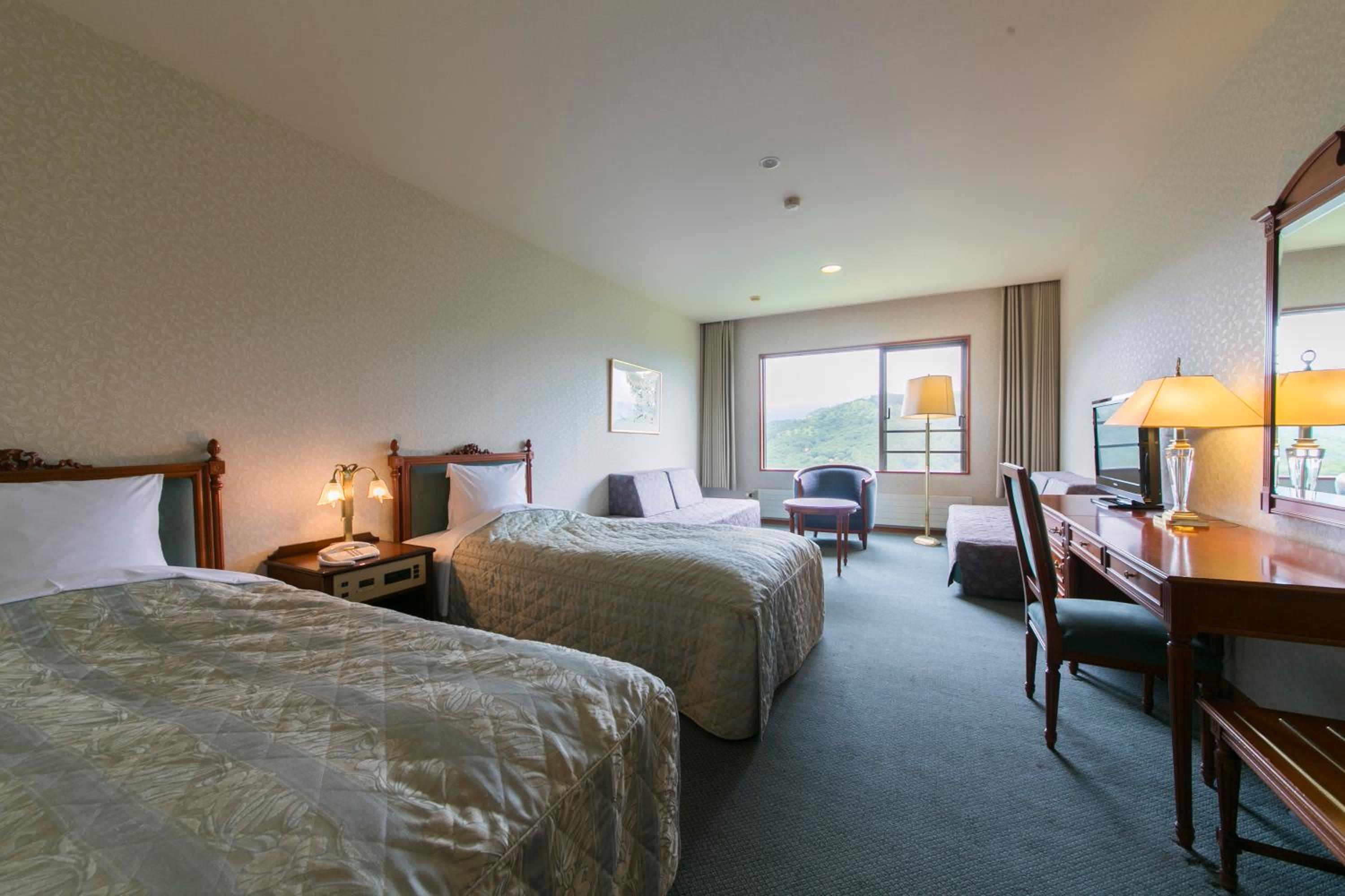 Standard Twin Room - Photo 7