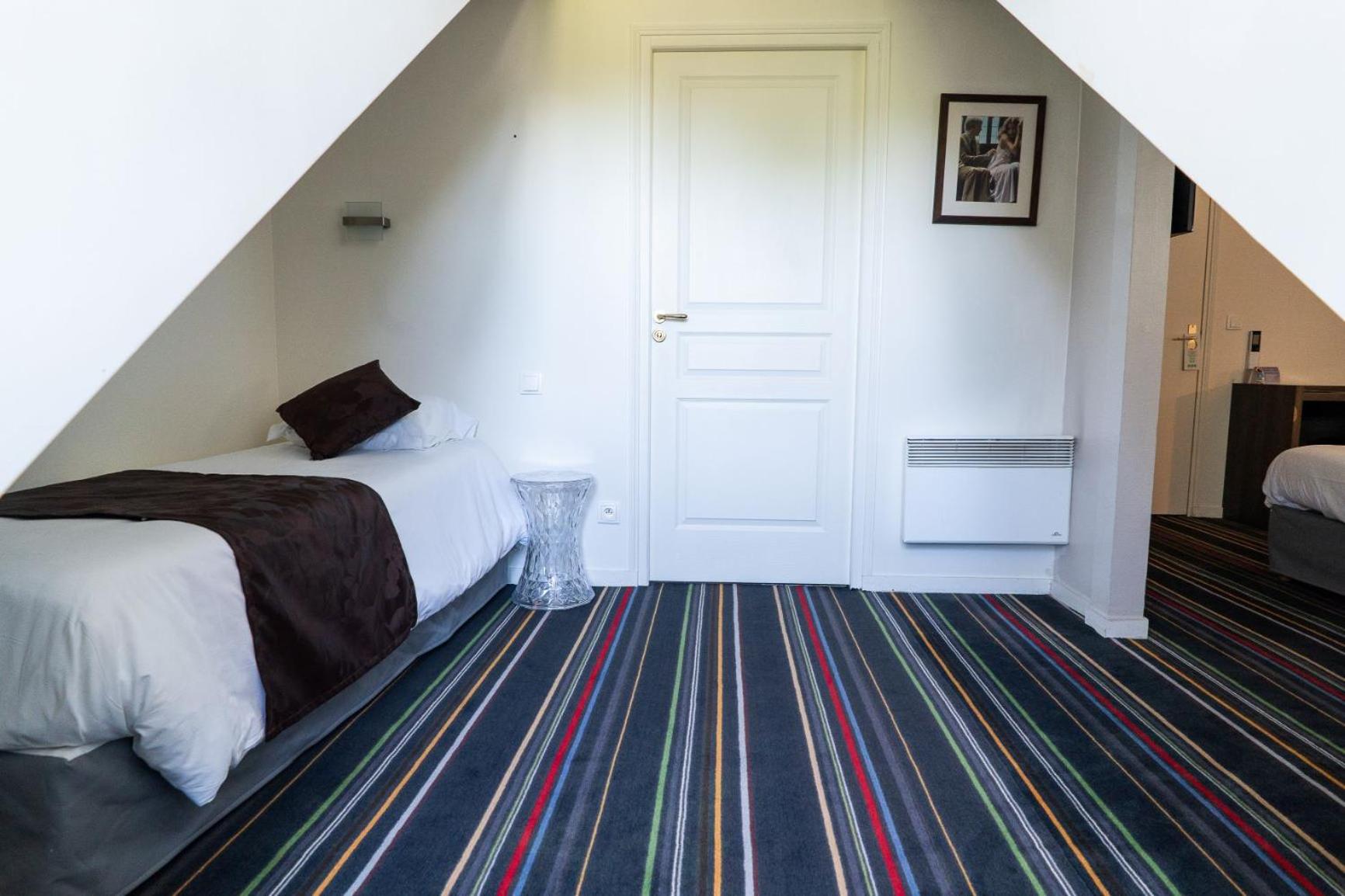 Triple Room - 1 Double Bed + One Single Bed
