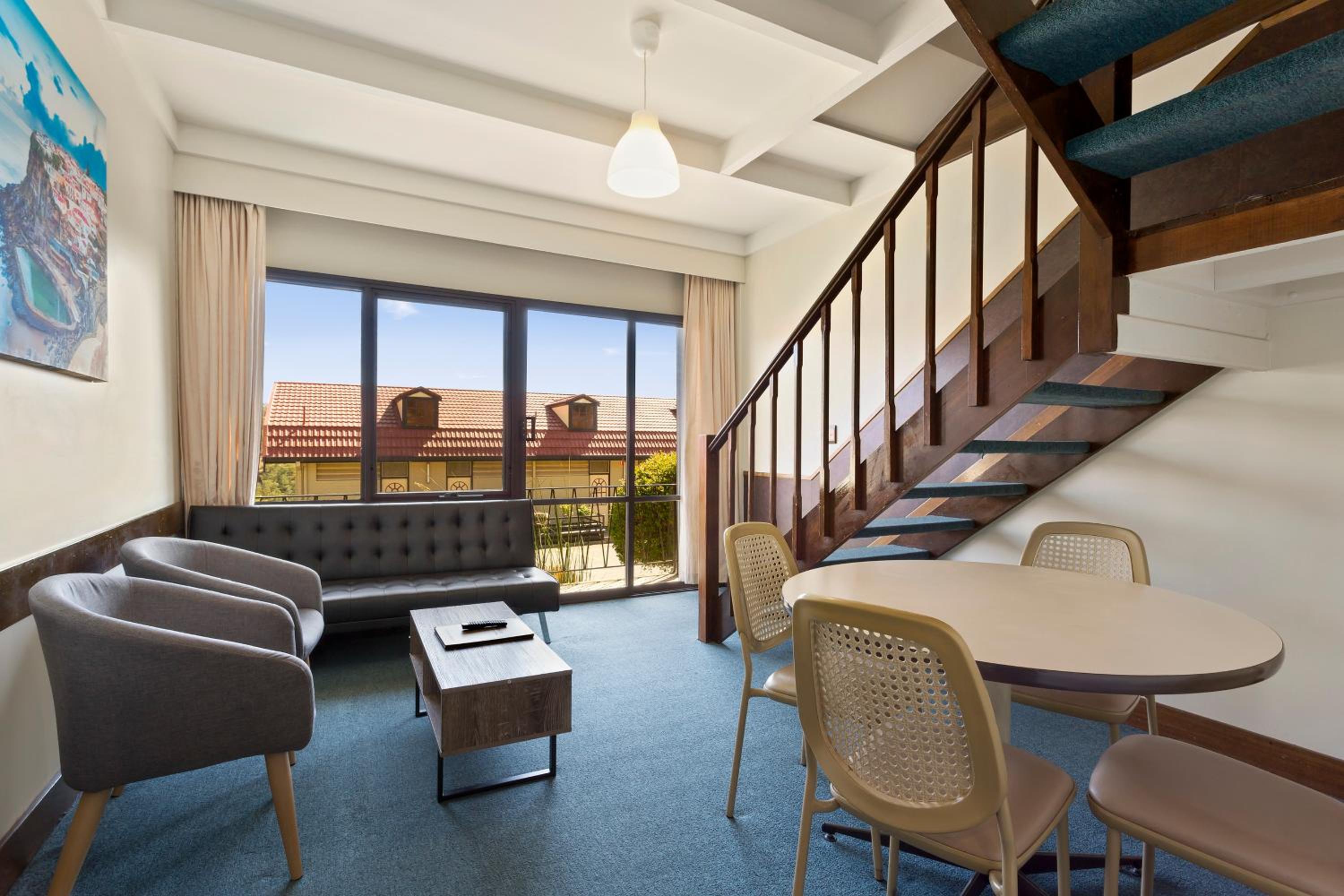 Three-Bedroom Apartment - Photo 10