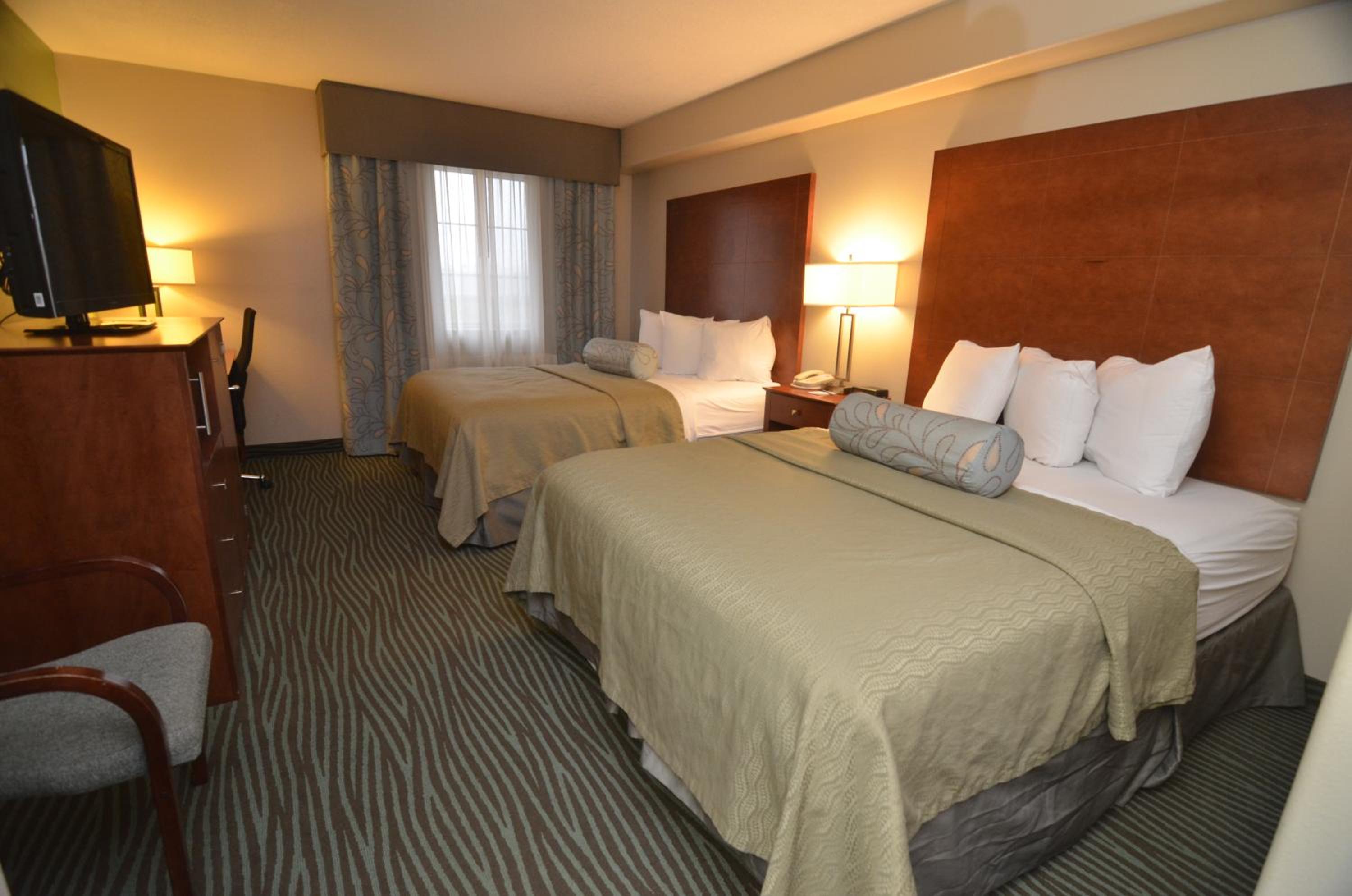 Deluxe Queen Room with Two Queen Beds - Non-Smoking photo 1