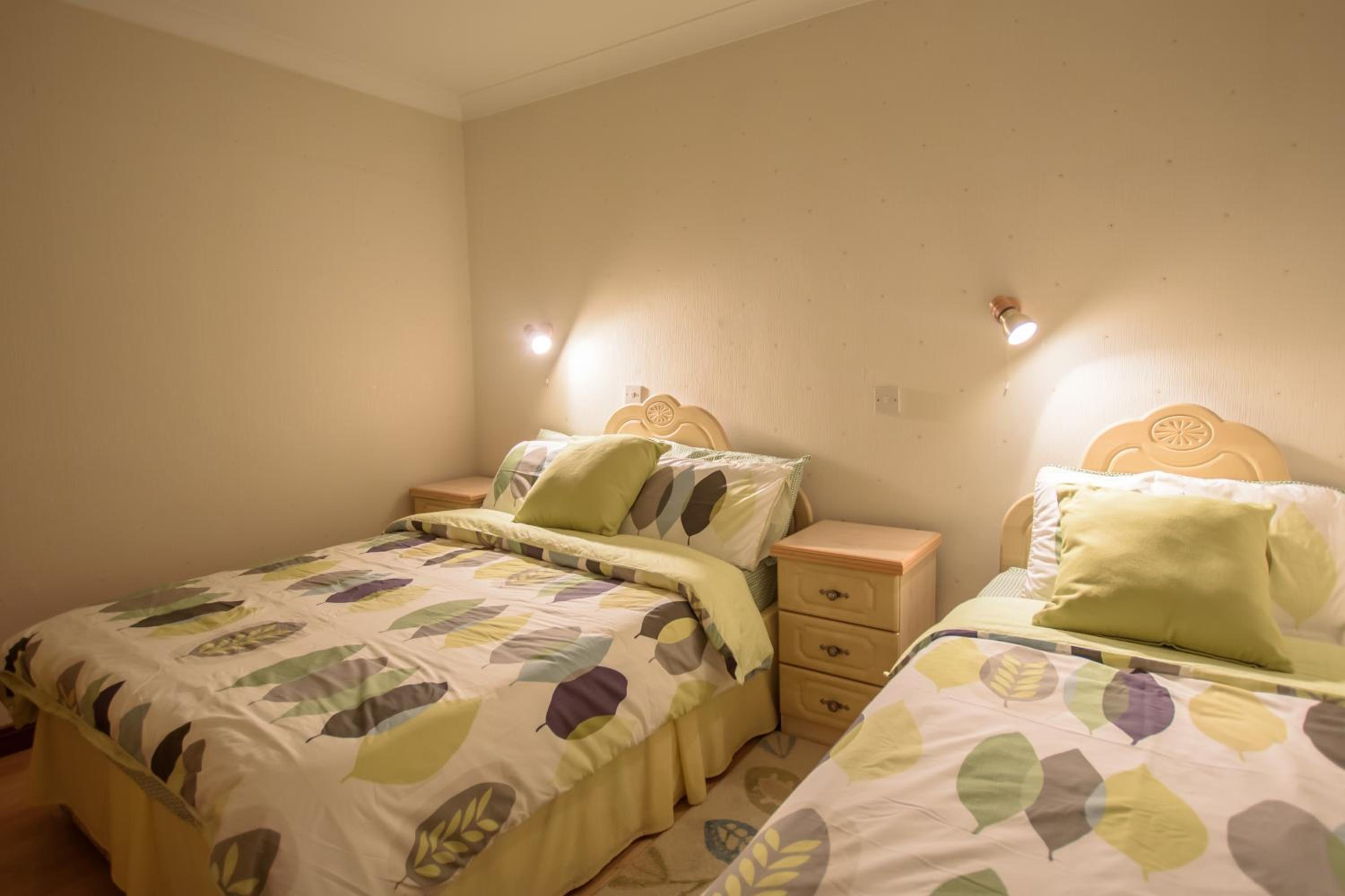 Three-Bedroom Apartment - Photo 10
