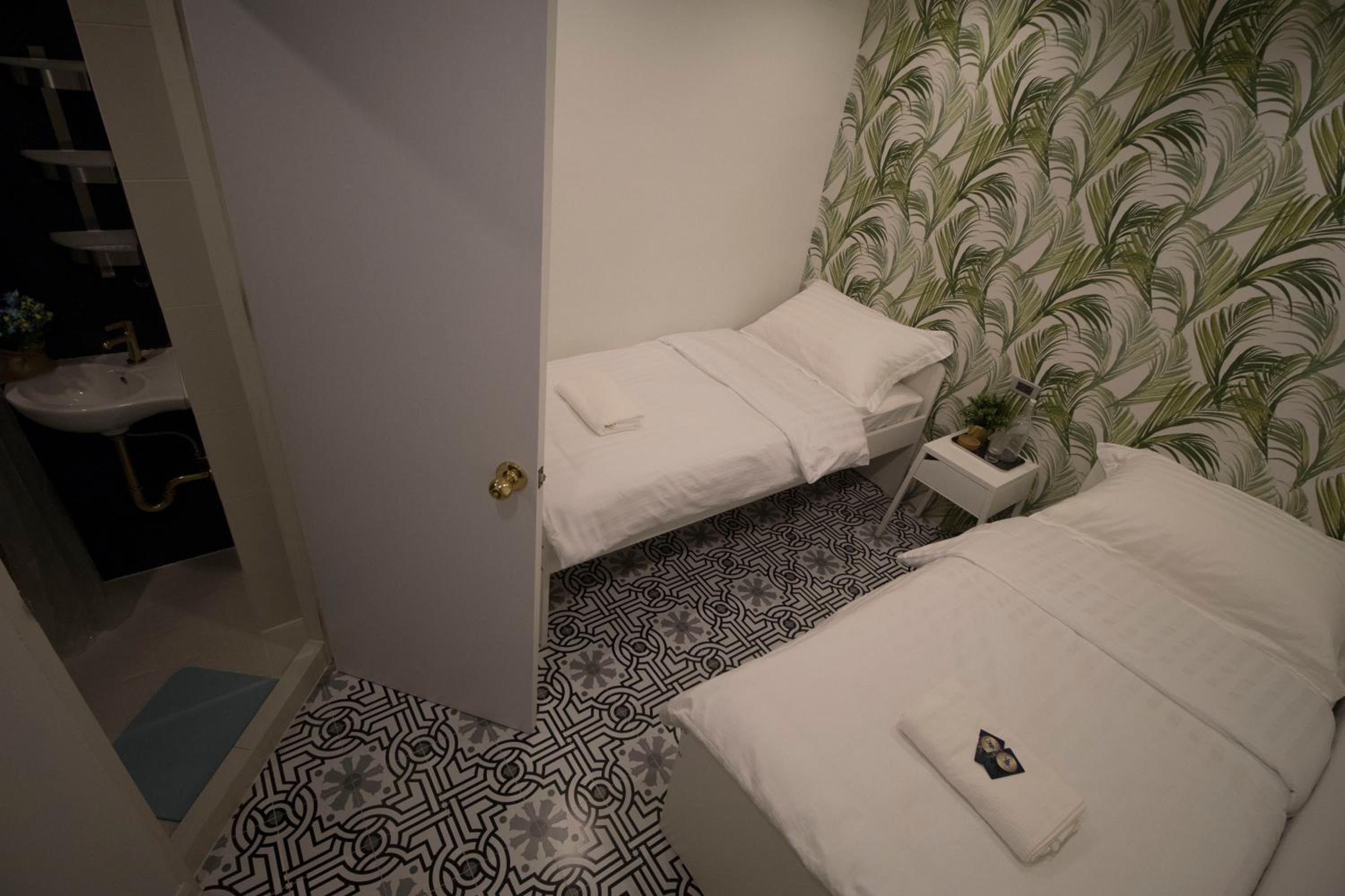 Twin Room with Private Bathroom (No Window) photo 3