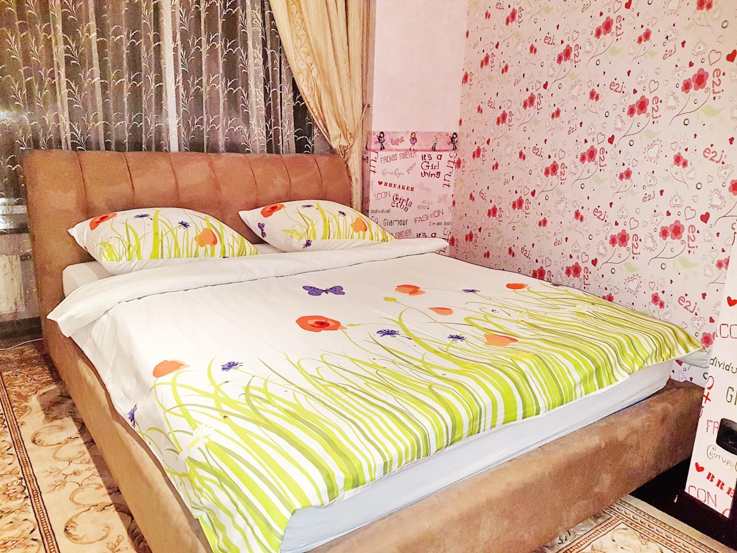 Two-Bedroom Apartment with Balcony and River View