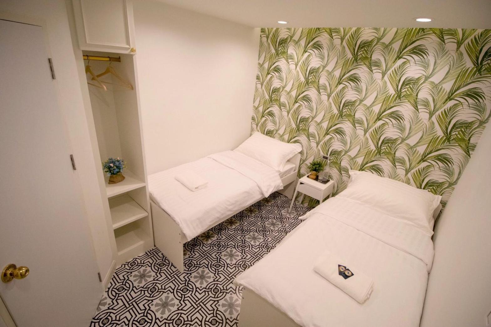 Twin Room with Private Bathroom (No Window) photo 2