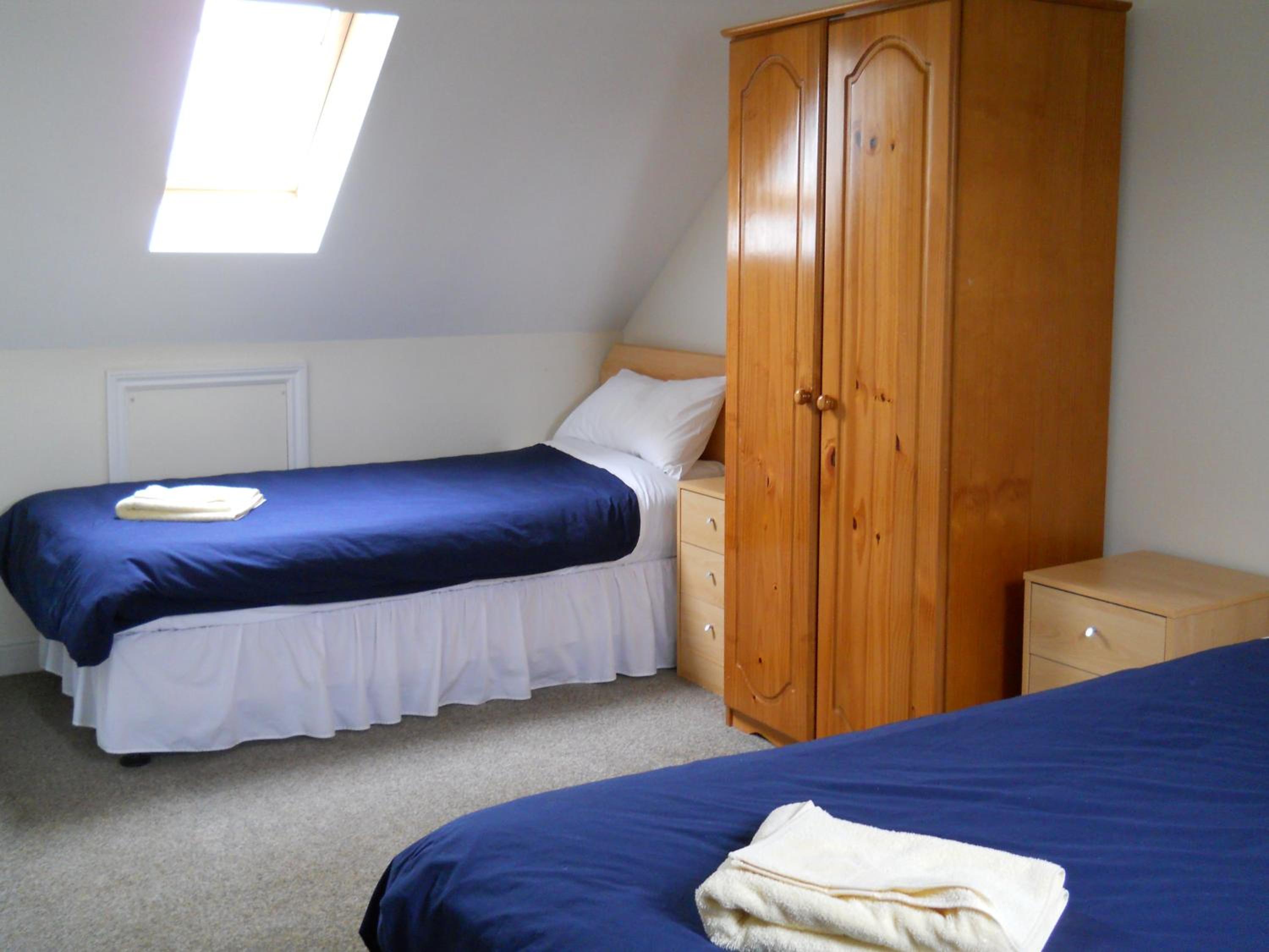 Three-Bedroom Apartment - Photo 2