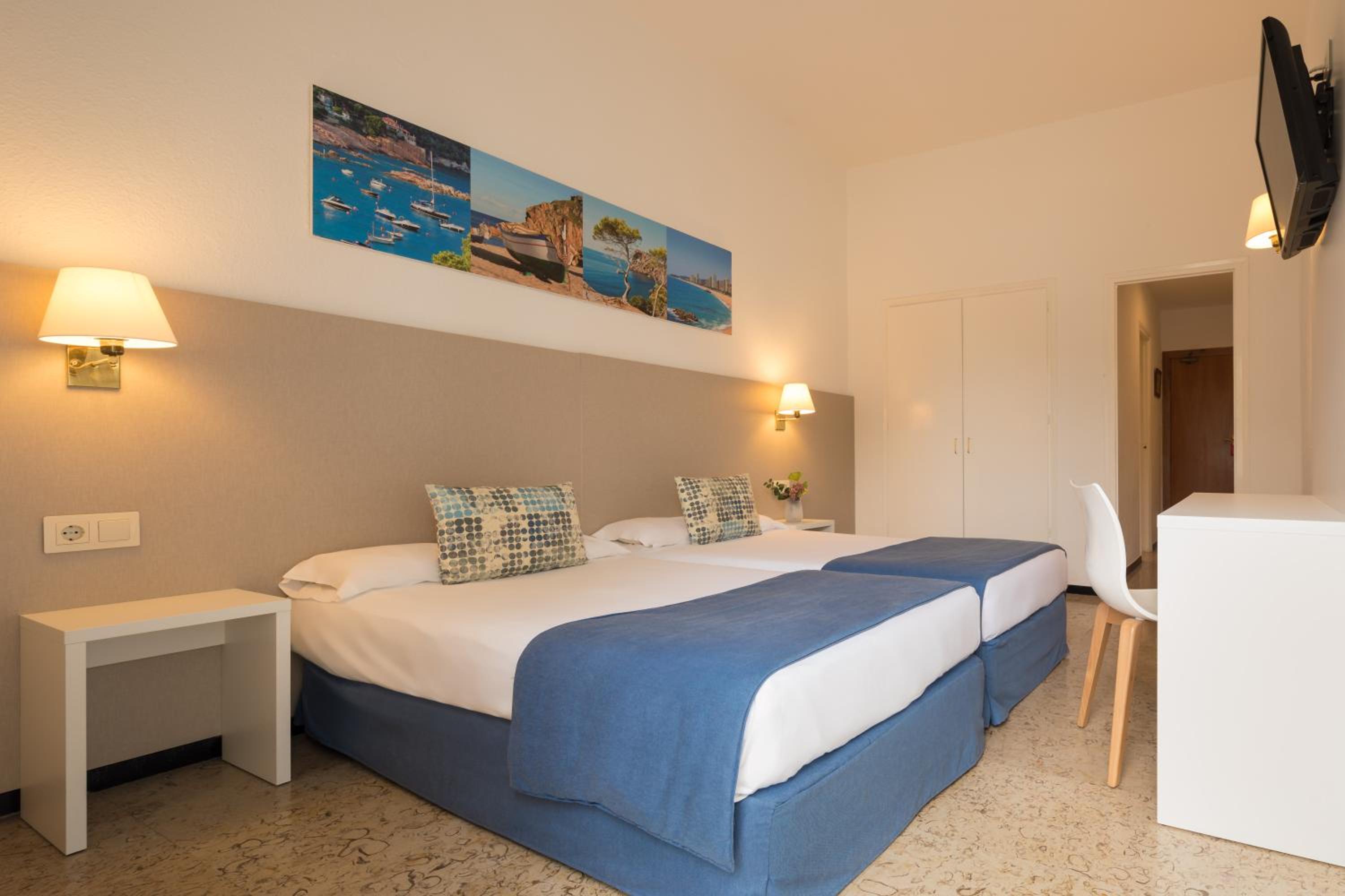 Habitación Cuádruple (2 Adultos + 2 Niños)