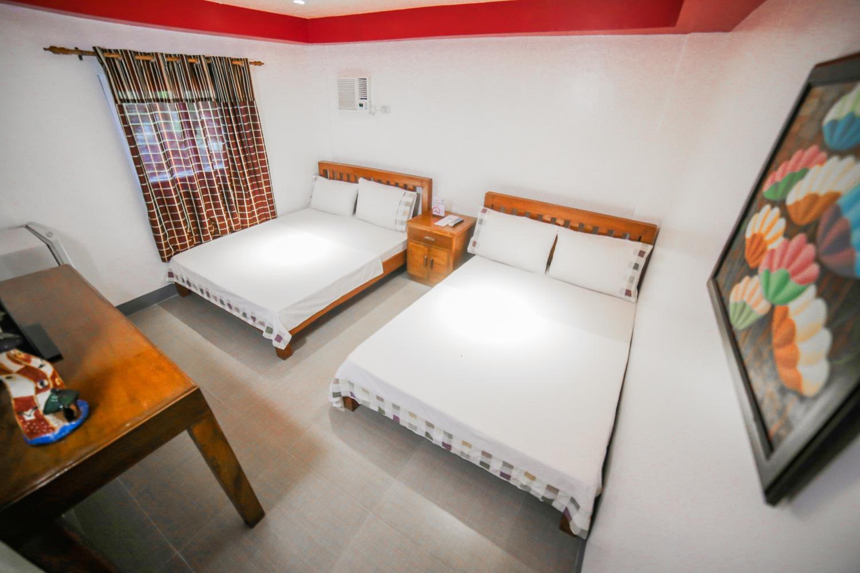 Quadruple Room - Photo 1