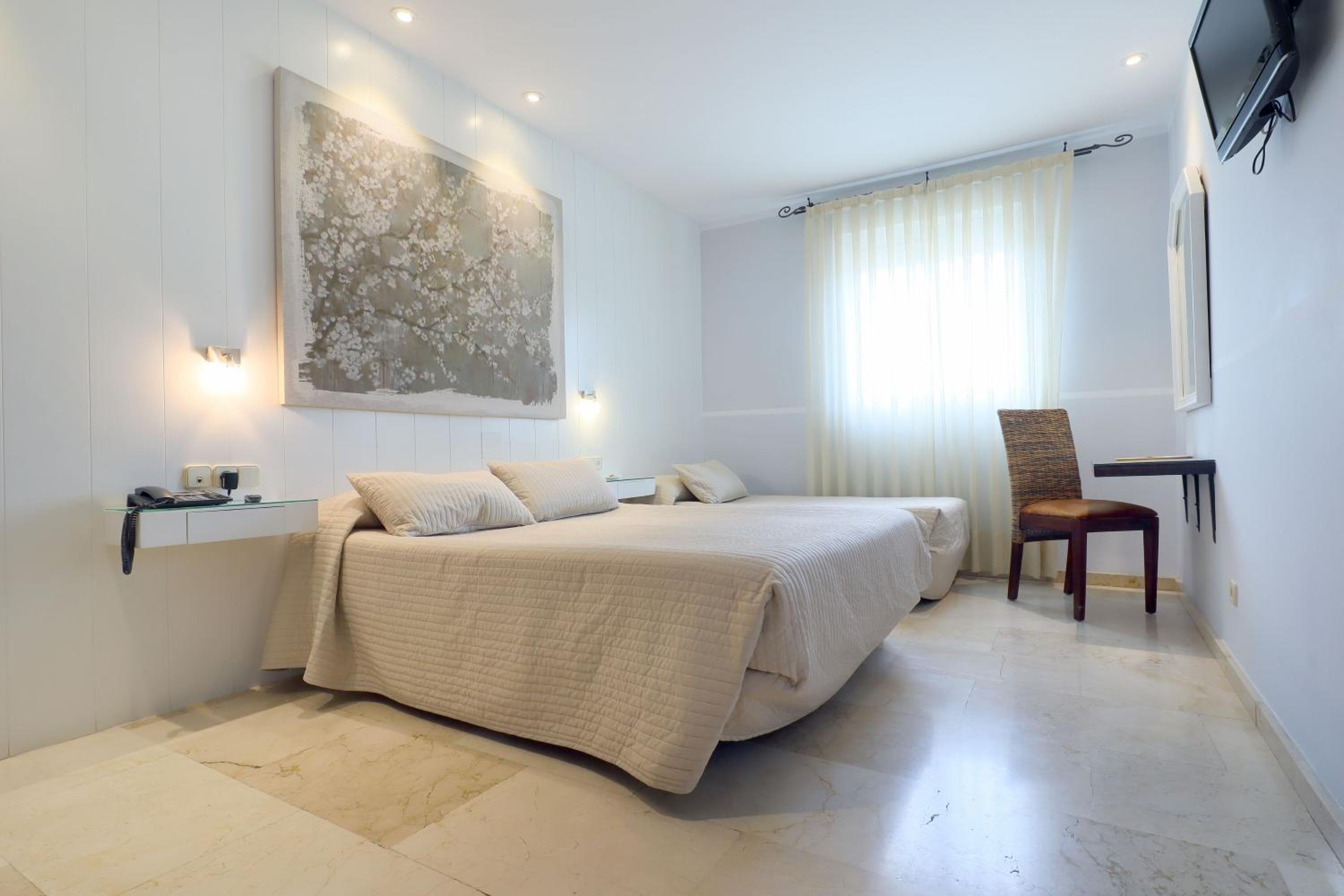 Habitación Triple con Estacionamiento