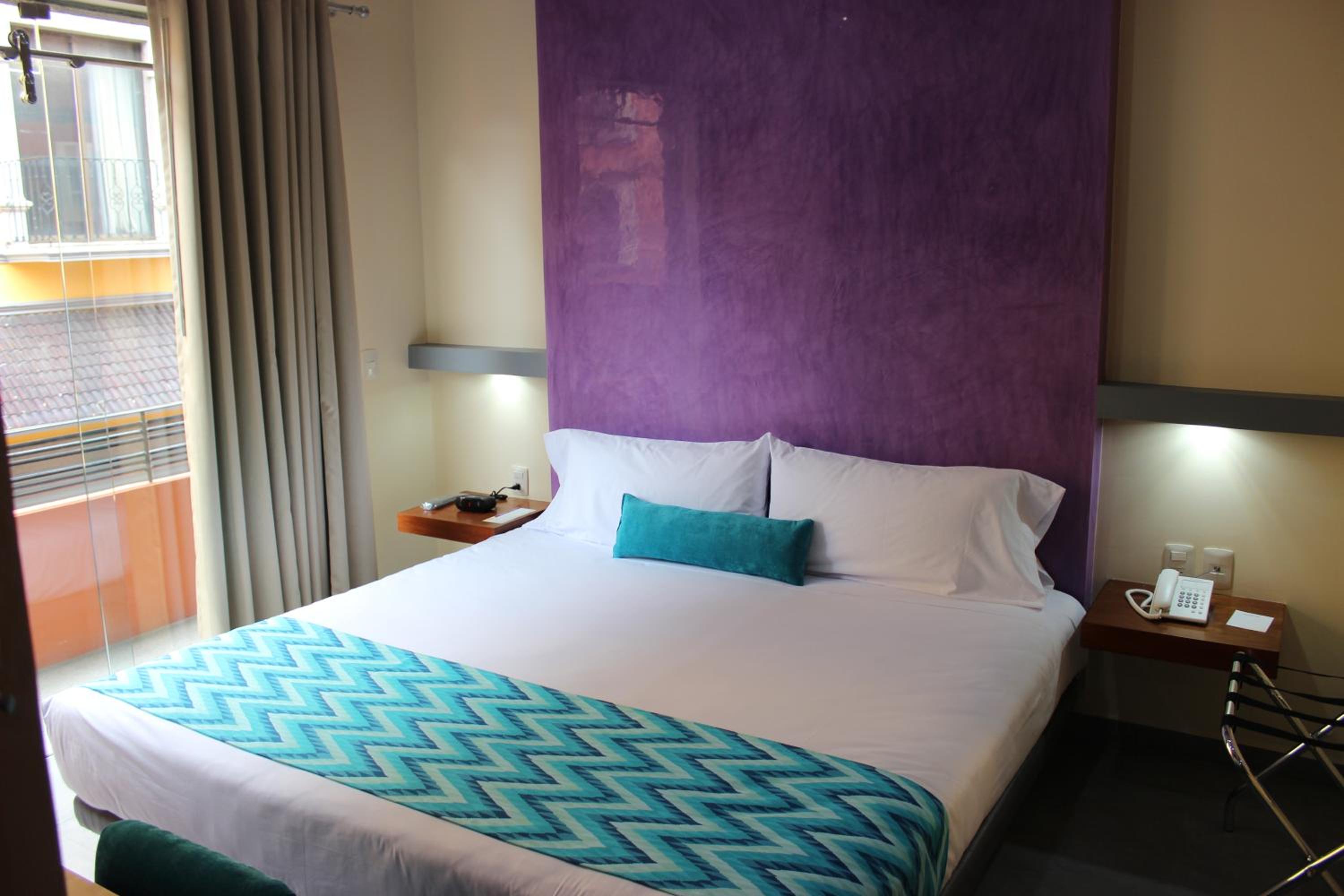 Superior King Room with Interior and Exterior View