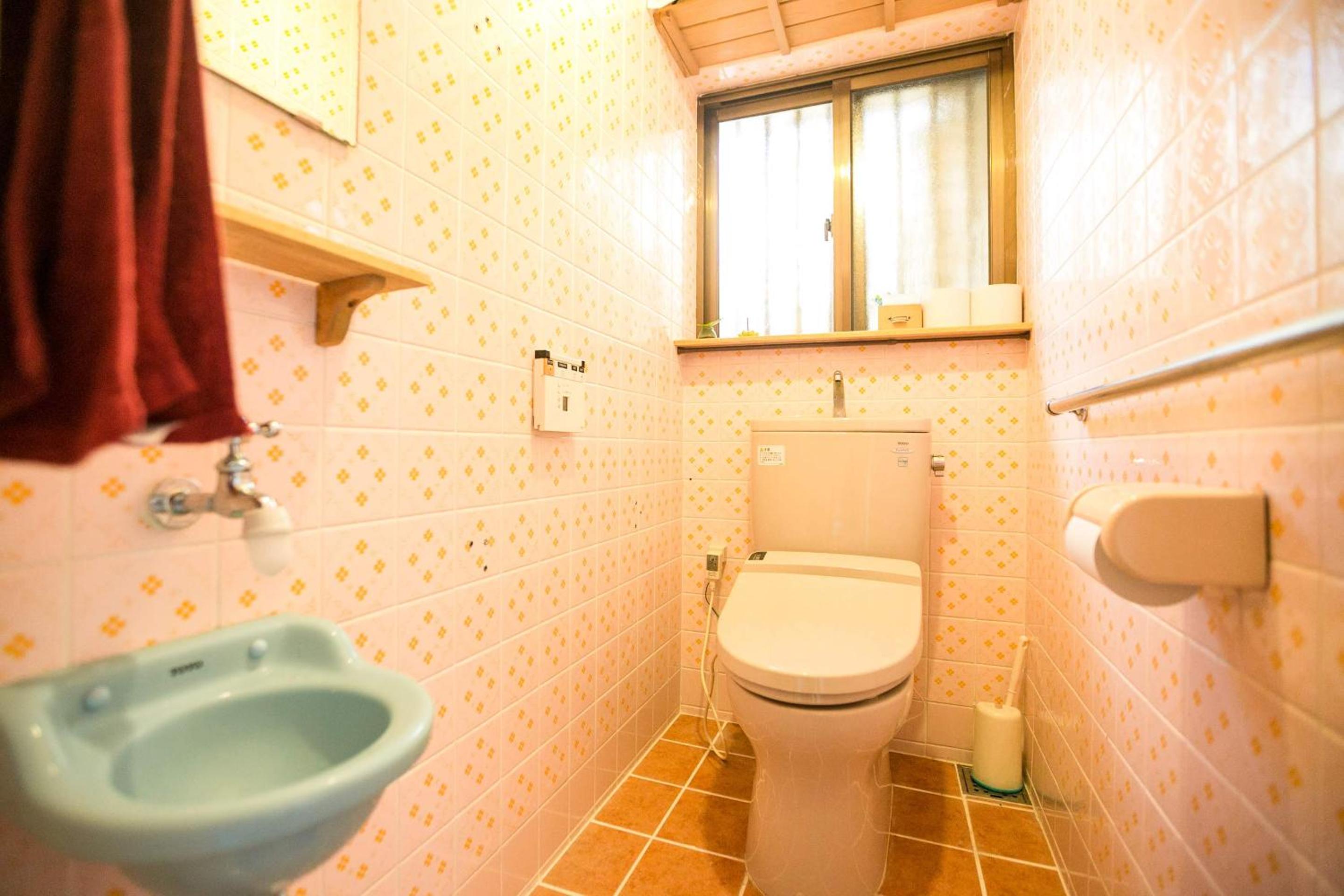Four-Bedroom House - Photo 43