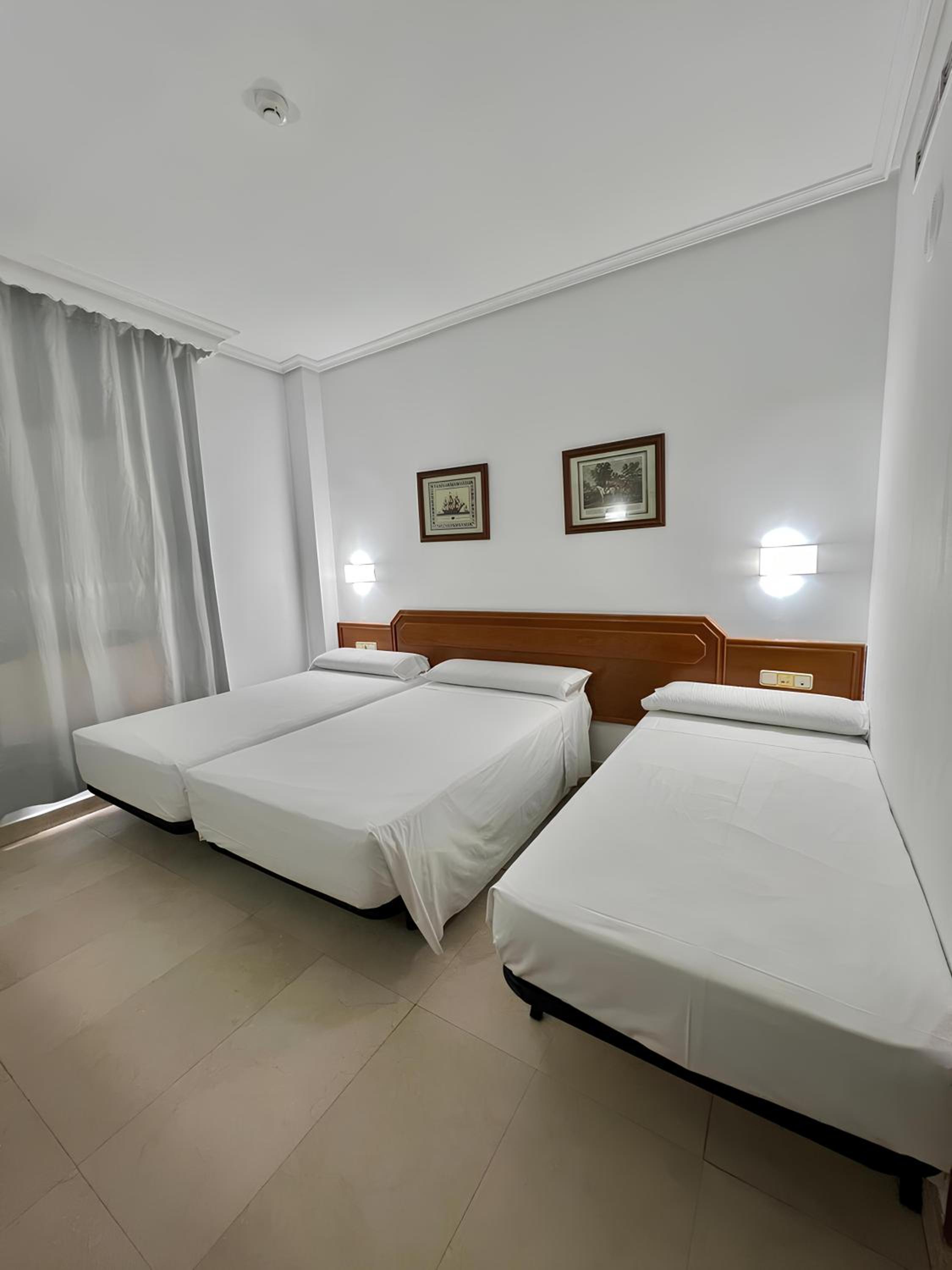 Triple Room (2 Adults + 2 Child)
