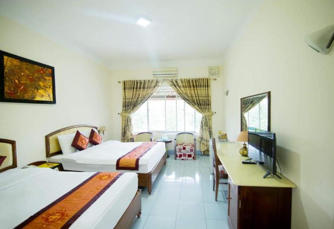 Standard Twin Room - Photo 1