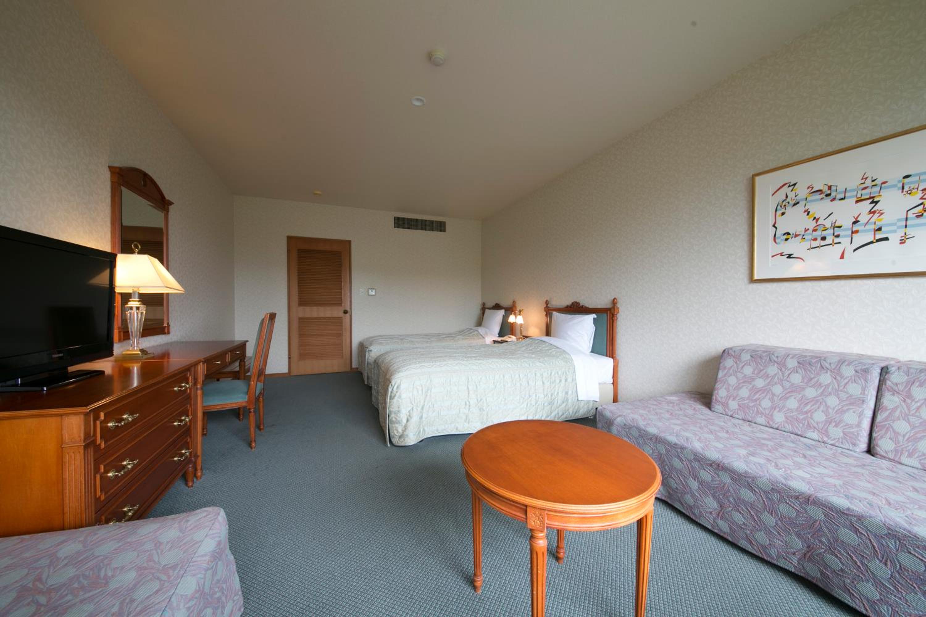 Standard Twin Room - Photo 4