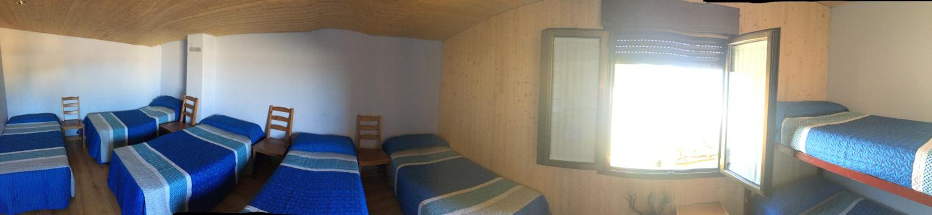 Habitación familiar con baño externo