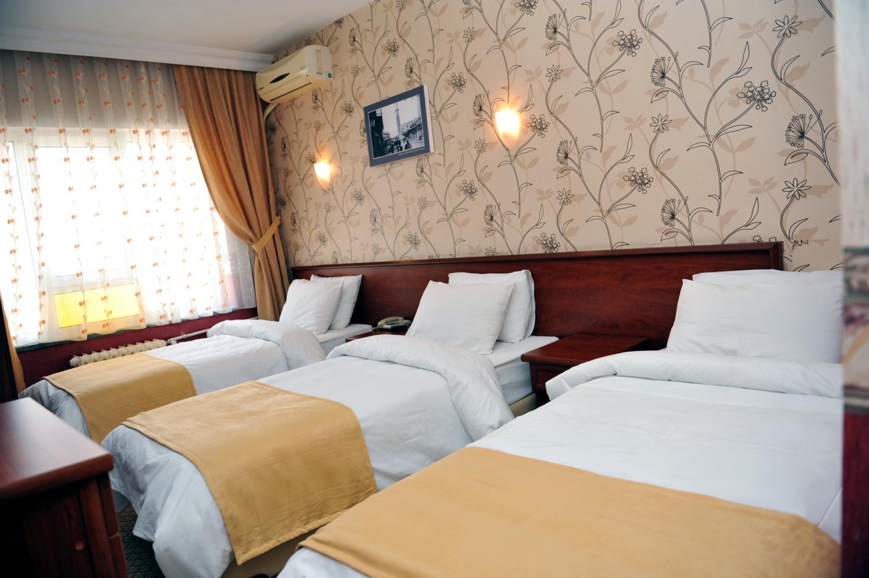 Standard Triple Room - Photo 1