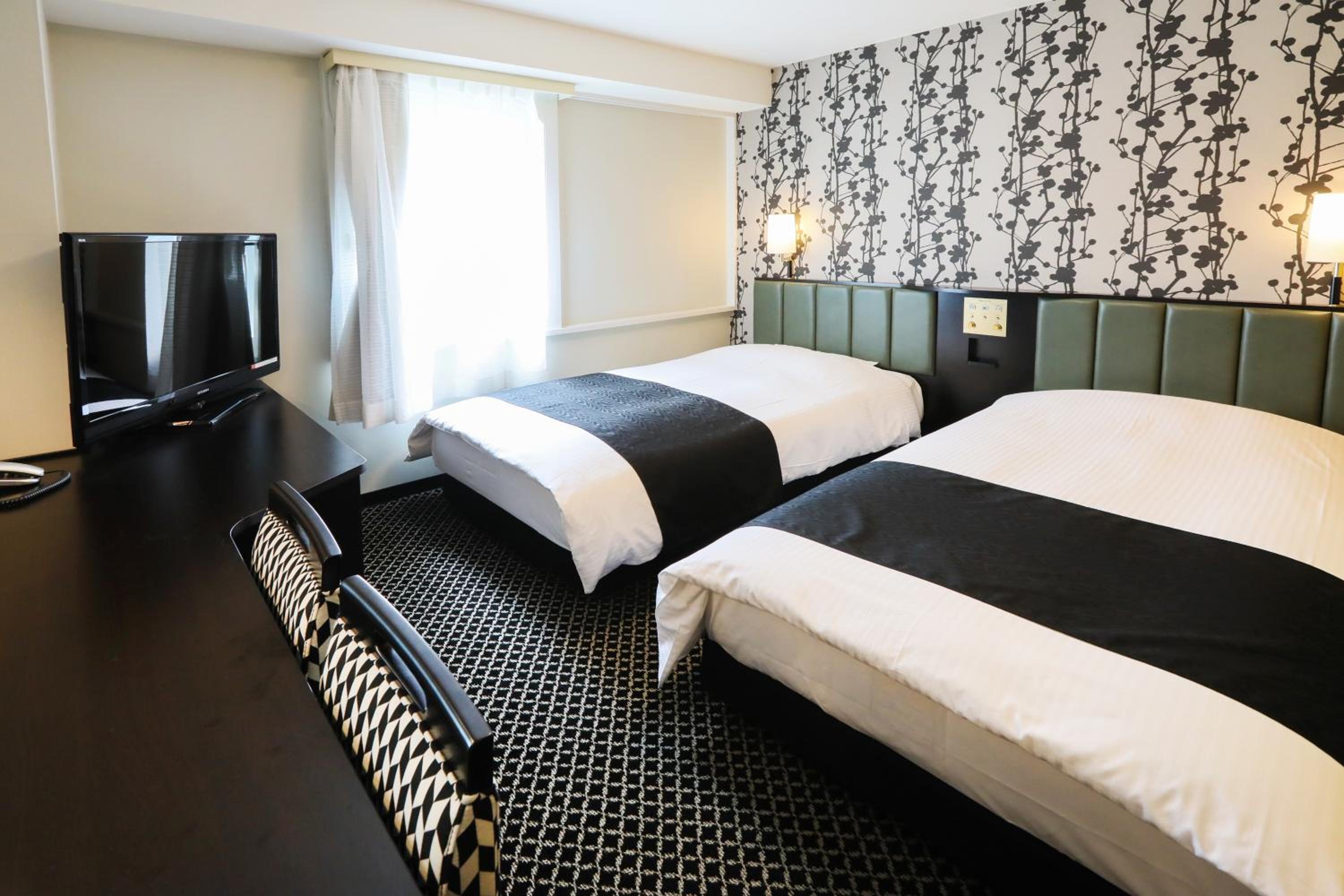 Twin Room - Non-Smoking - Photo 1