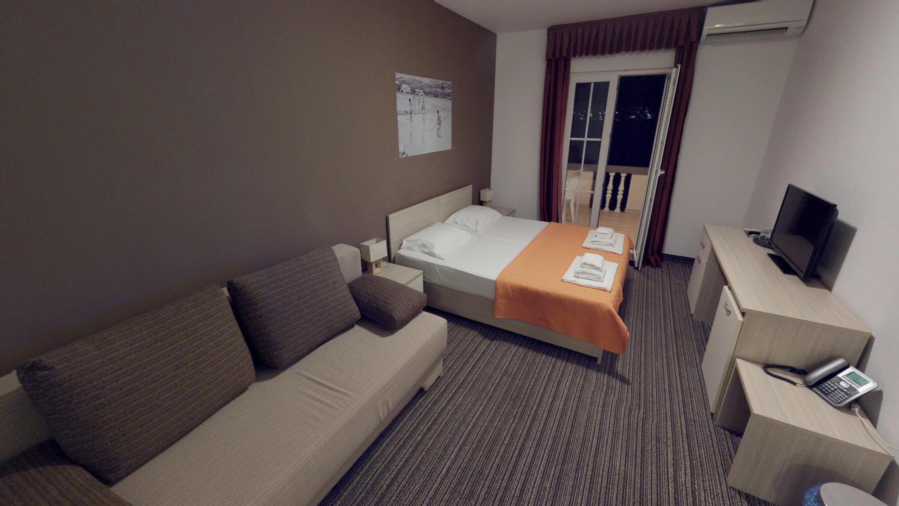 Family Room with Balcony - Photo 1