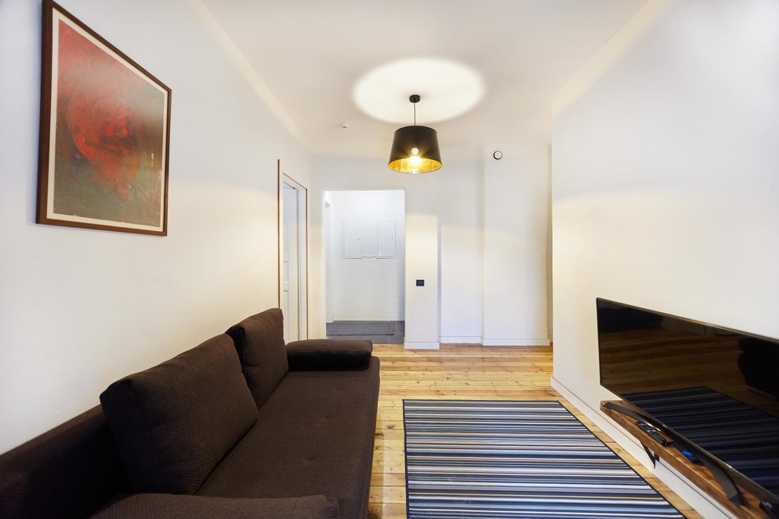 Four-Bedroom Apartment with Balcony  - Photo 11