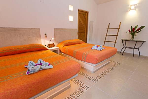 Standard Queen Room with Two Queen Beds - Photo 1